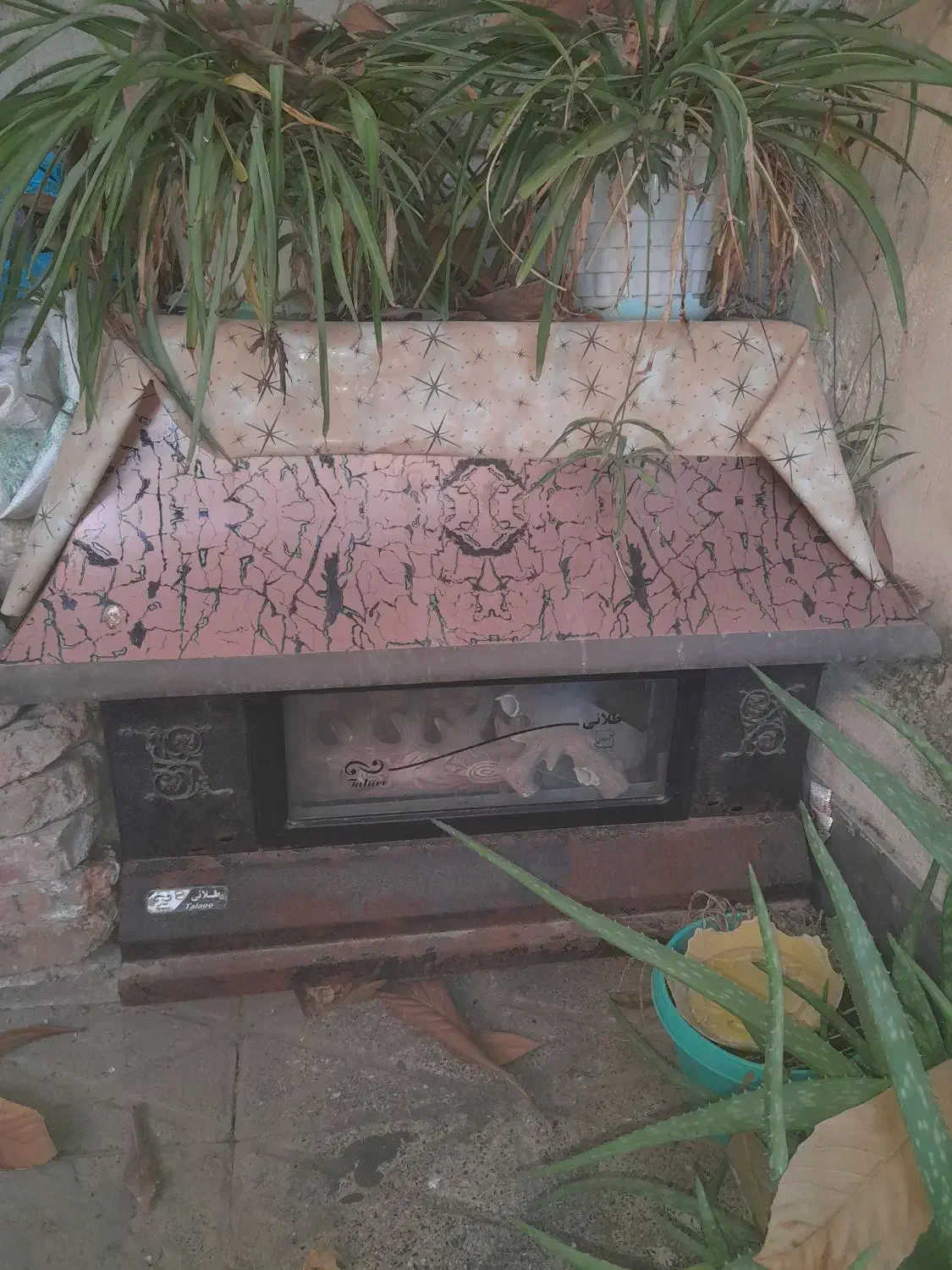 بخاری شومینه ای .|بخاری، هیتر، شومینه|کلاله, |دیوار