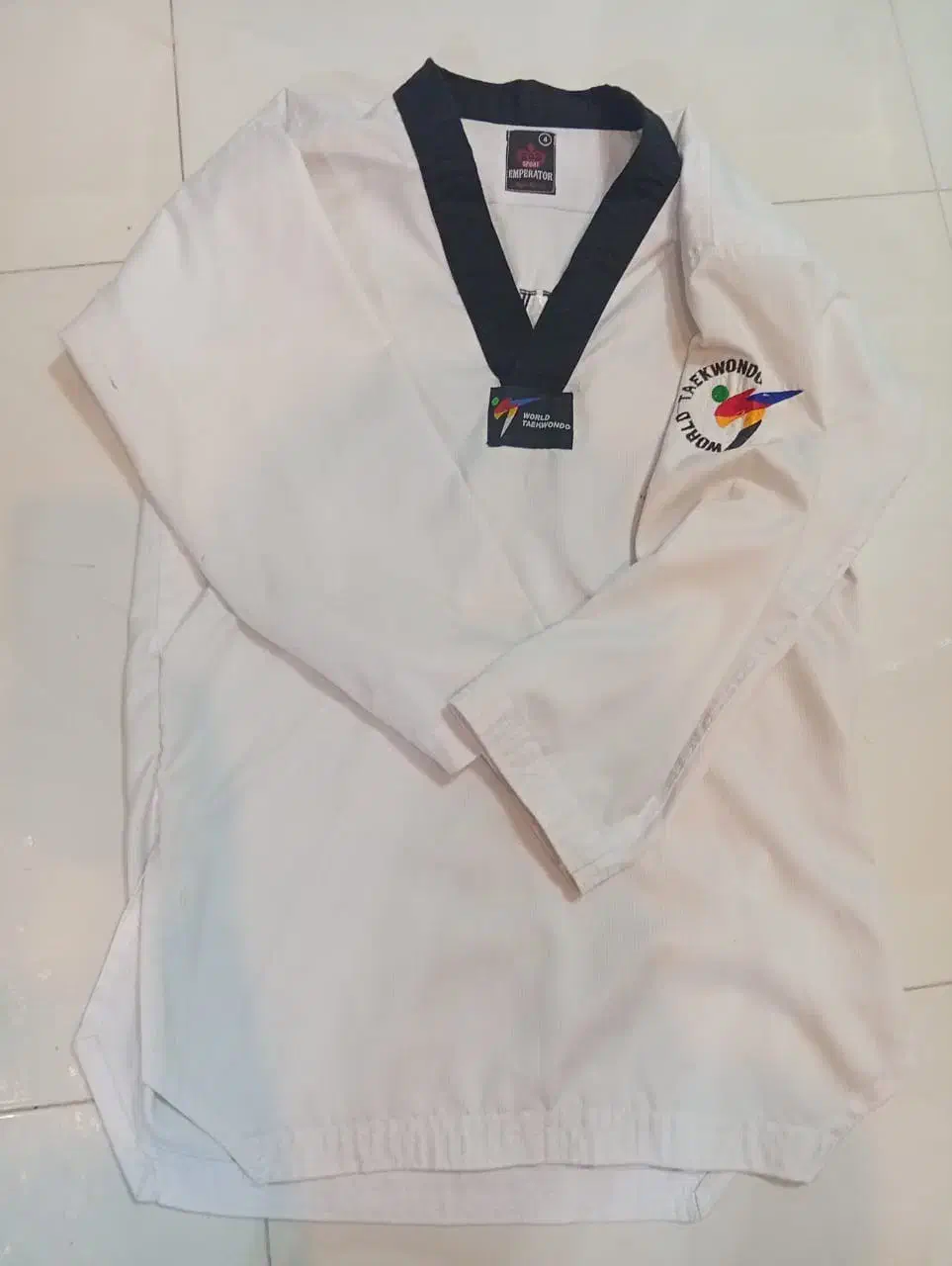 لباس رزم. تکواندو و دفاع شخصی|لباس|بهمن صغاد, |دیوار