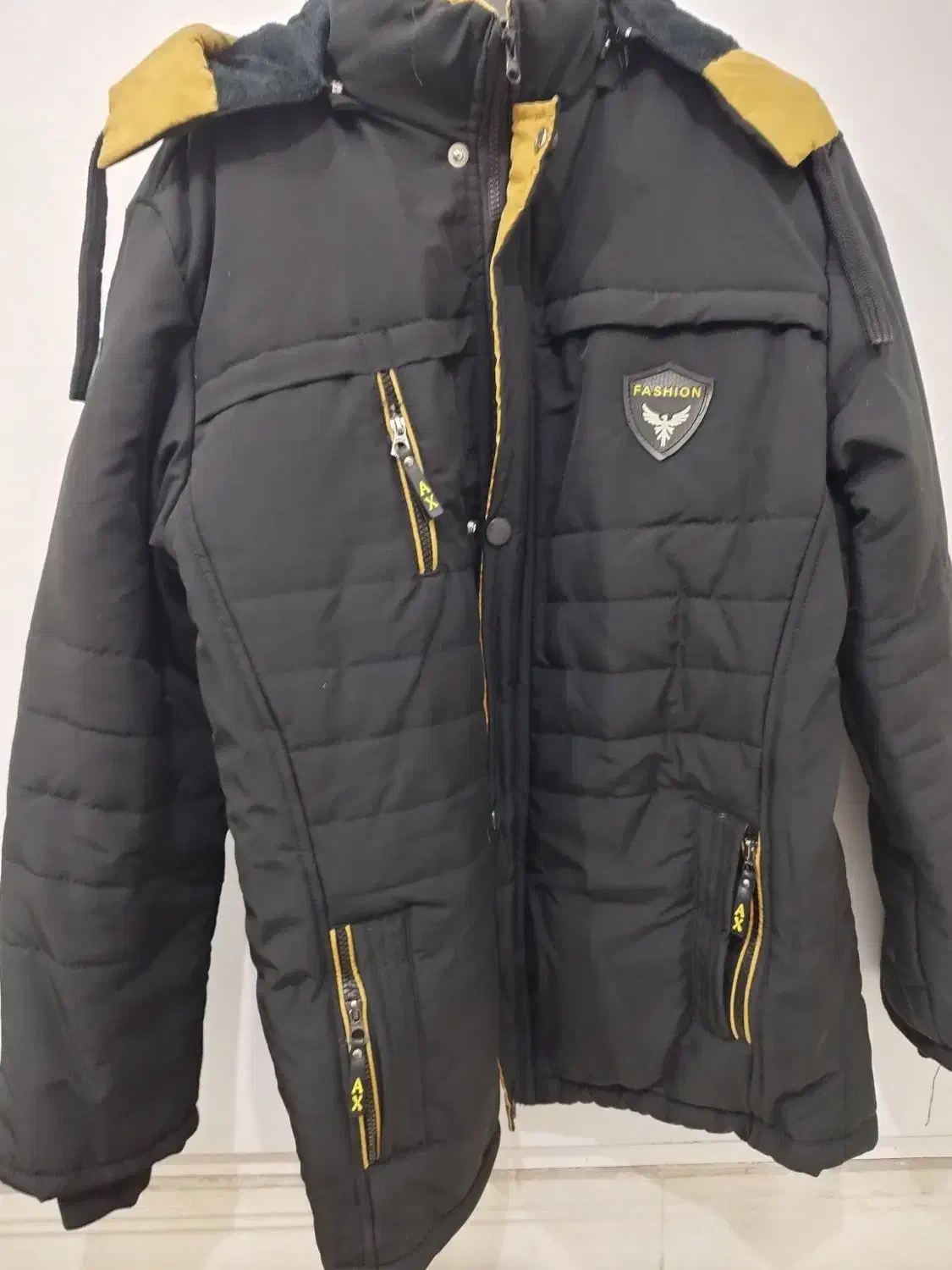 کاپشن|لباس|اهواز, منبع اب|دیوار