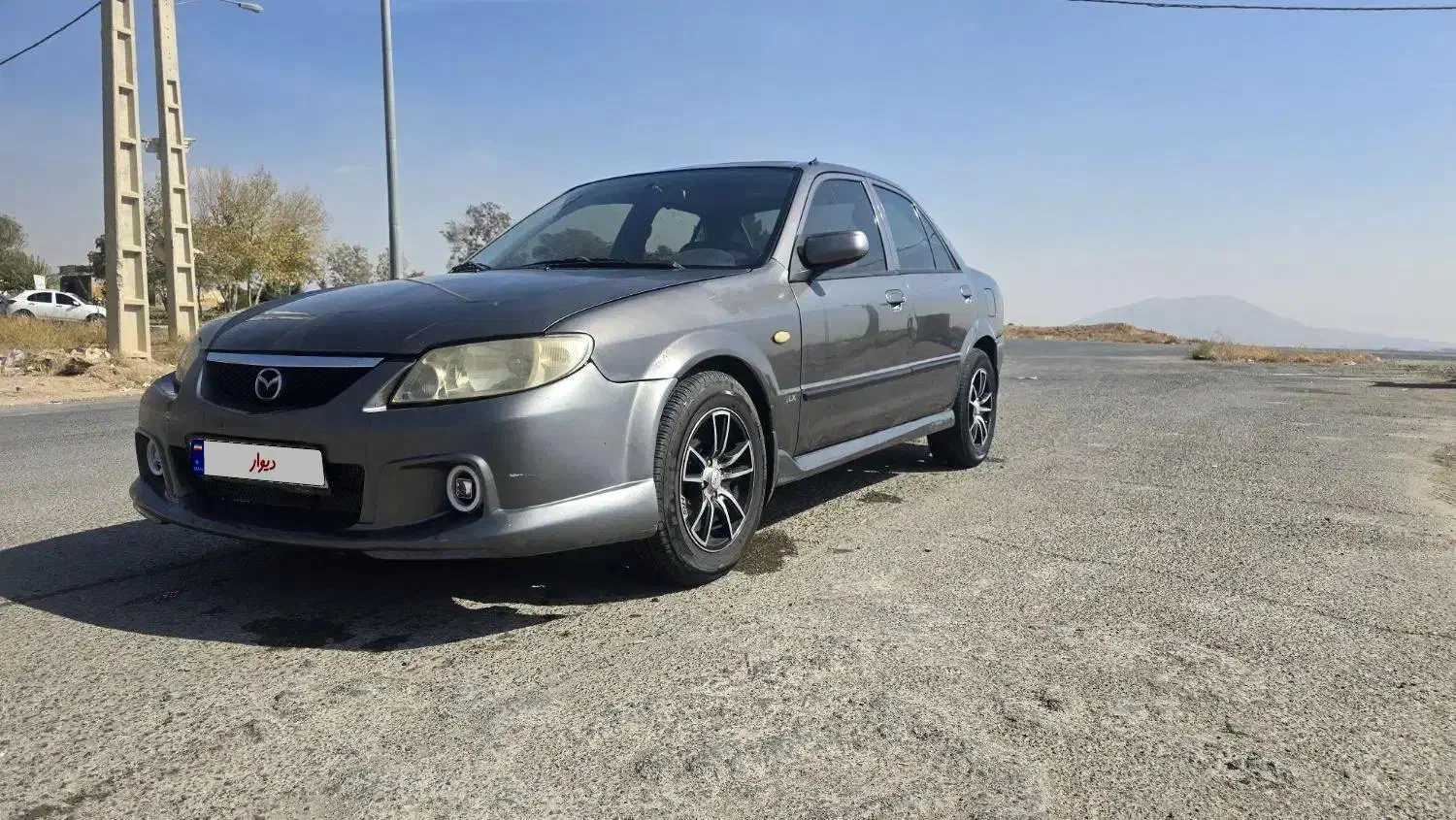 مزدا ۳۲۳ تیپ ۵ با لوازم|خودرو سواری و وانت|کرج, شهرک بهارستان|دیوار