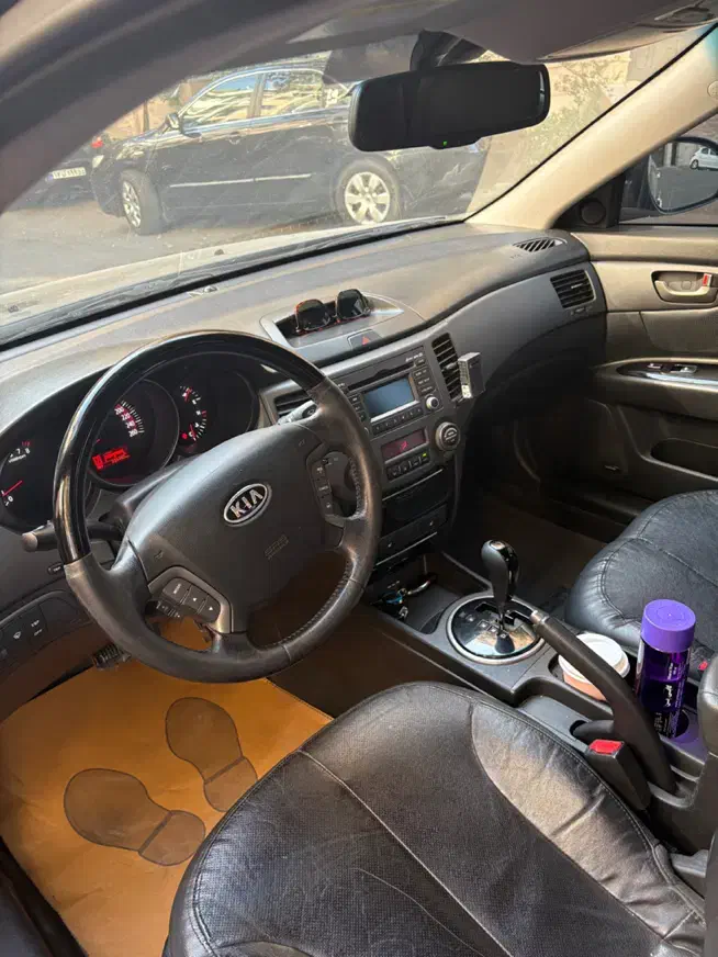 اپتیما ۲۰۱۰ مشکی|خودرو سواری و وانت|تهران, نیاوران|دیوار