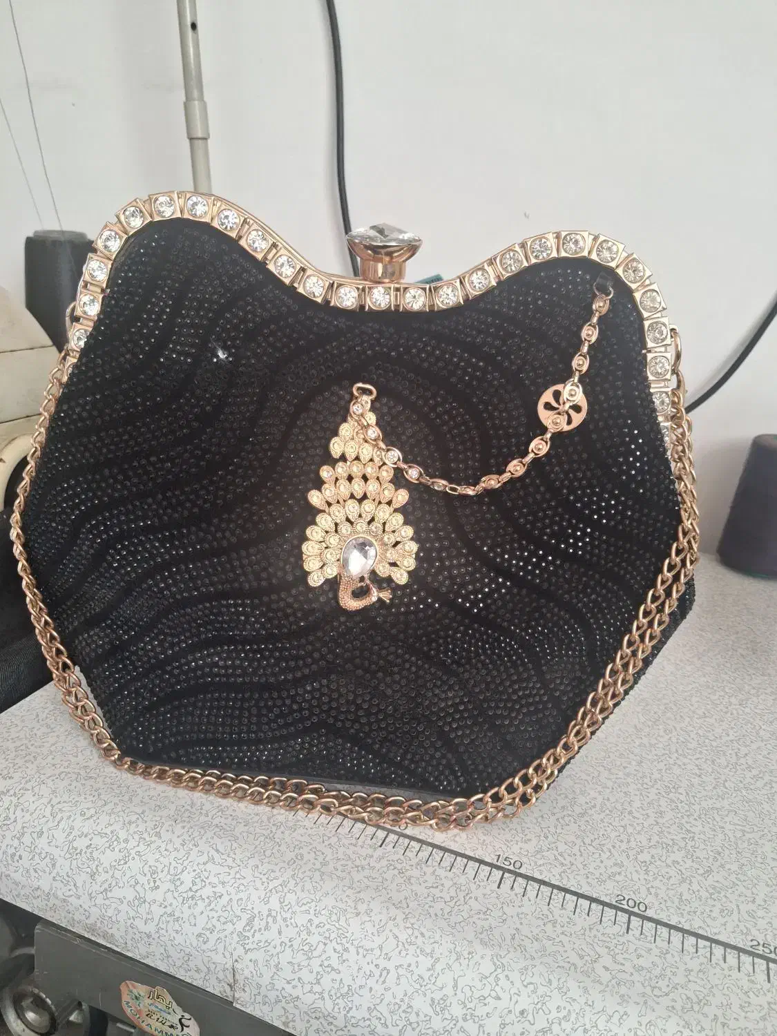 کیف مجلسی|کیف، کفش، کمربند|مشهد, خواجه ربیع|دیوار