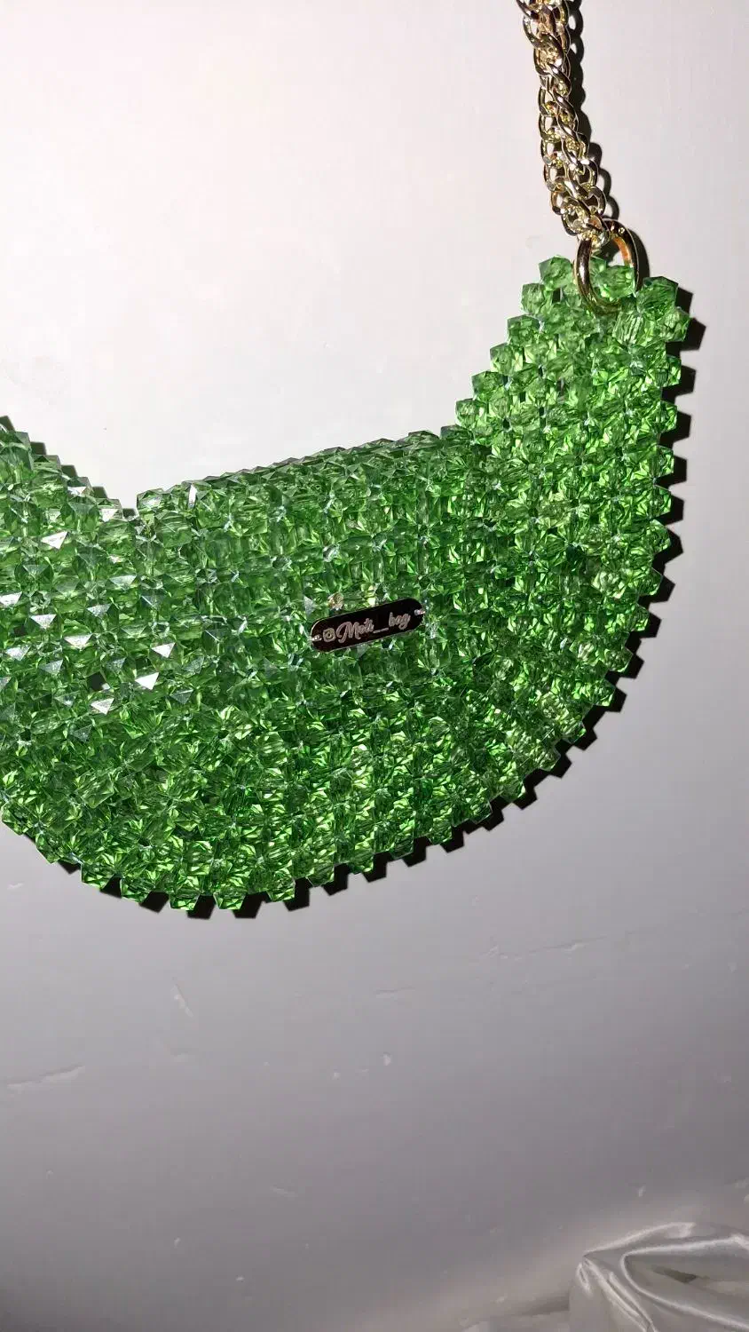 کیف مرواریدی|کیف، کفش، کمربند|رشت, امین الضرب|دیوار