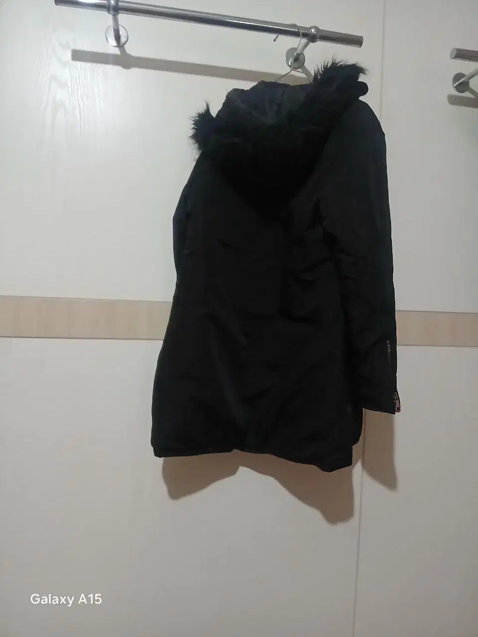 کاپشن|لباس|زنجان, |دیوار