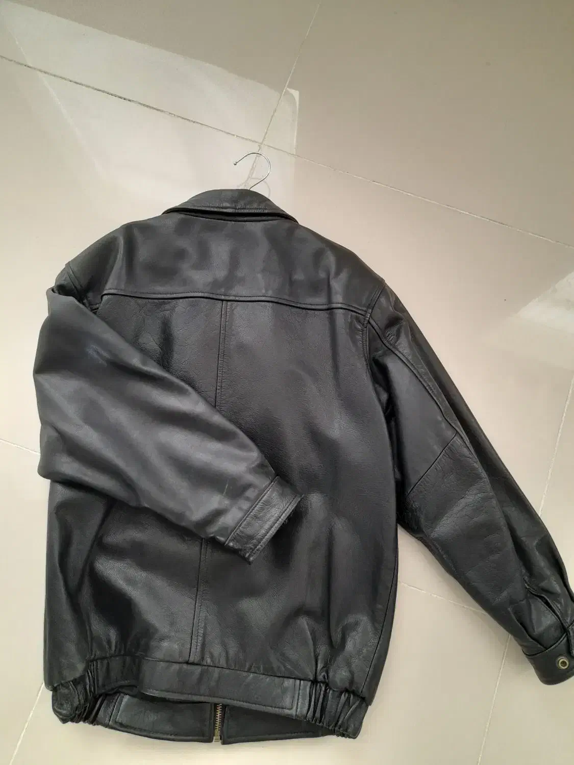 کاپشن آمریکایی|لباس|انزل, |دیوار