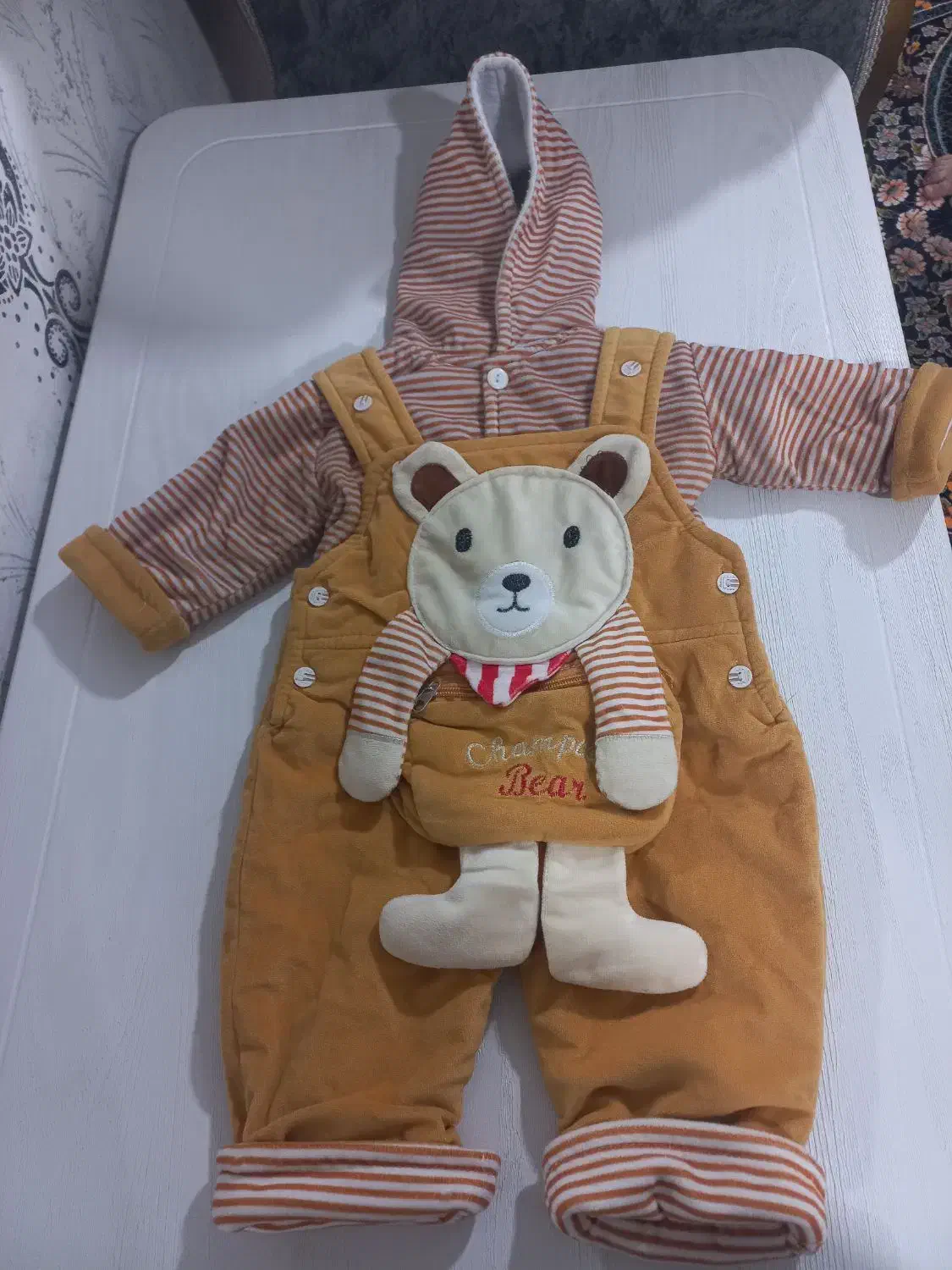 لباس بچه|کفش و لباس بچه|رشت, نخودچر|دیوار