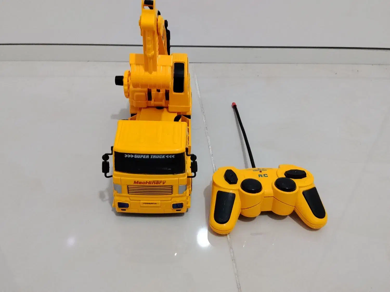 ماشین کنترلی خاک بردار|اسباببازی|اندیشه, اندیشه فاز ۱|دیوار