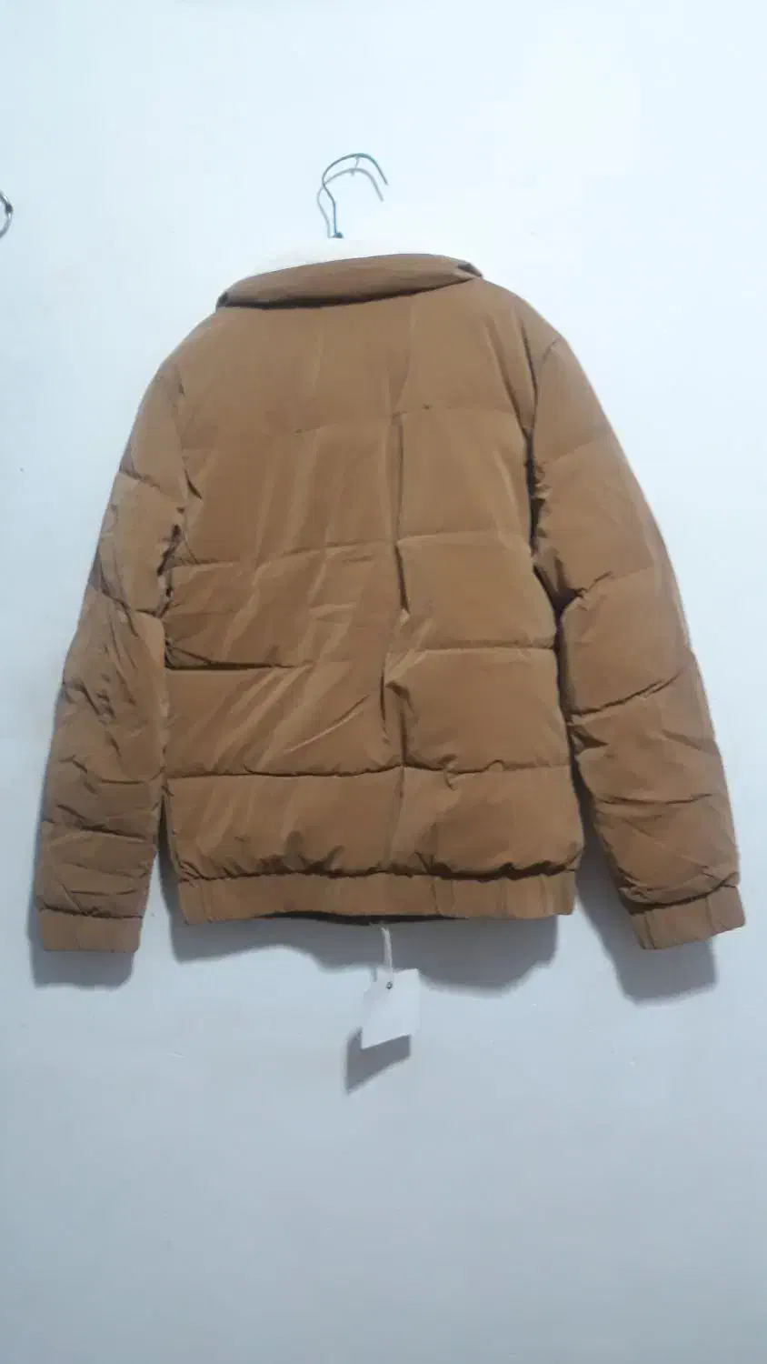 کاپشن|لباس|قم, شهرک امام حسن|دیوار