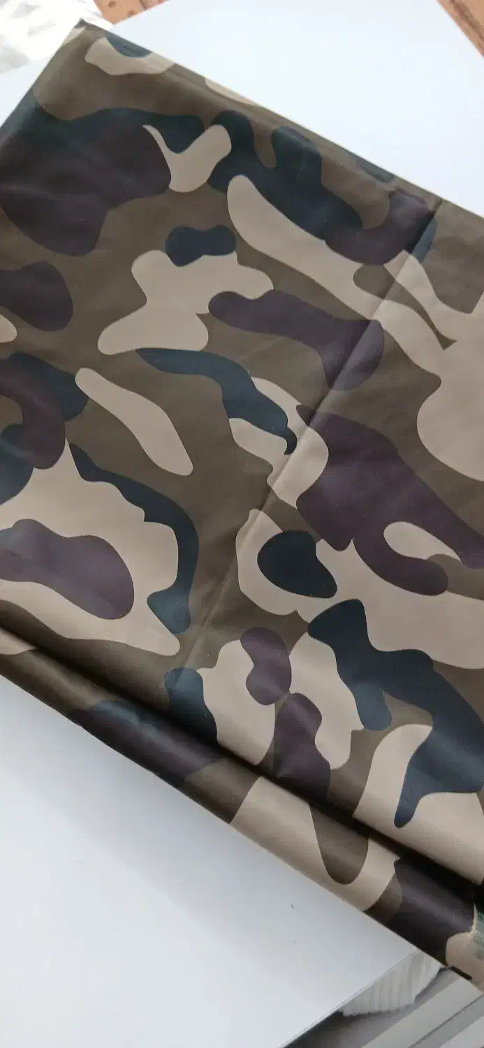 پارچه بارانی|لباس|تبریز, |دیوار