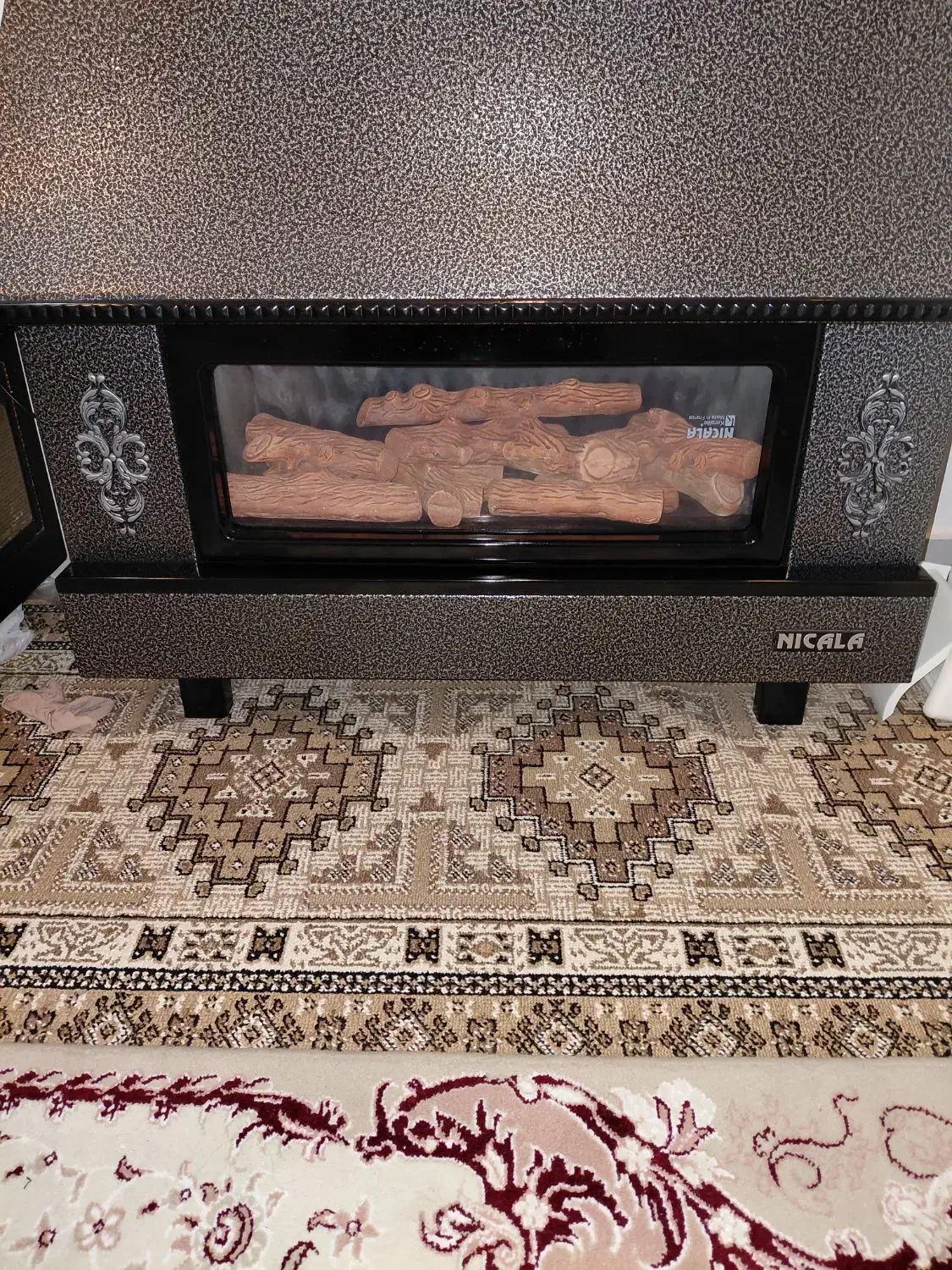 بخاری شومینه ای نیک کالا در حد نو|بخاری، هیتر، شومینه|بندر انزلی, معلم|دیوار