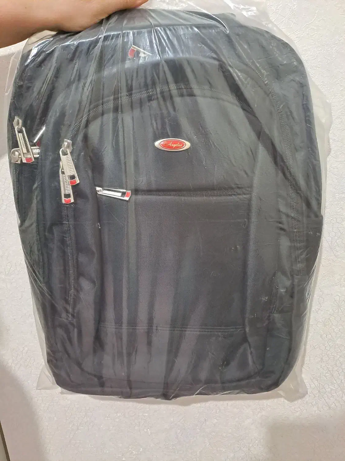 کوله پشتی|کیف، کفش، کمربند|قدس, شهر‌قدس|دیوار