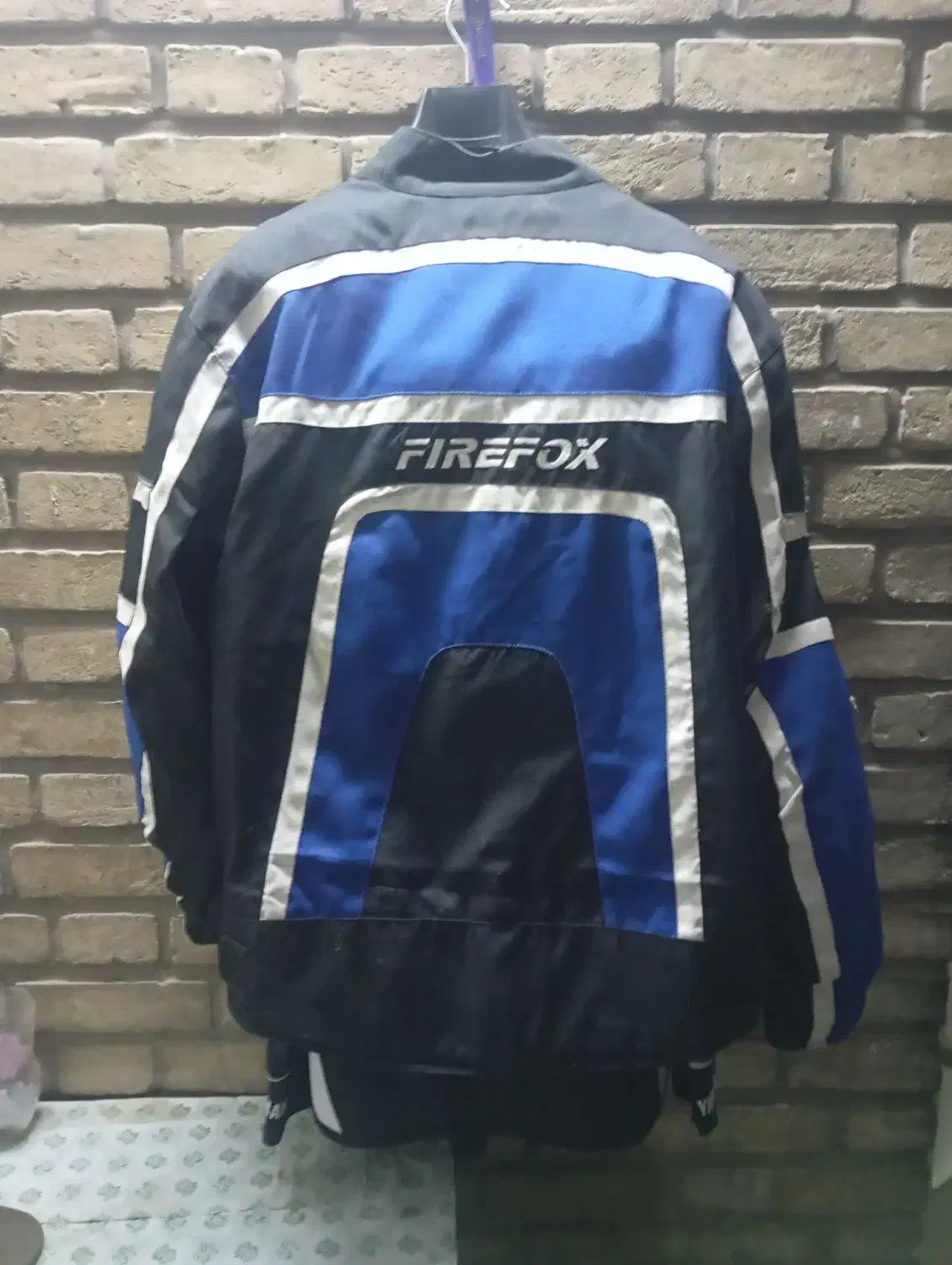 لباس موتورسواری|لباس|باغستان, |دیوار