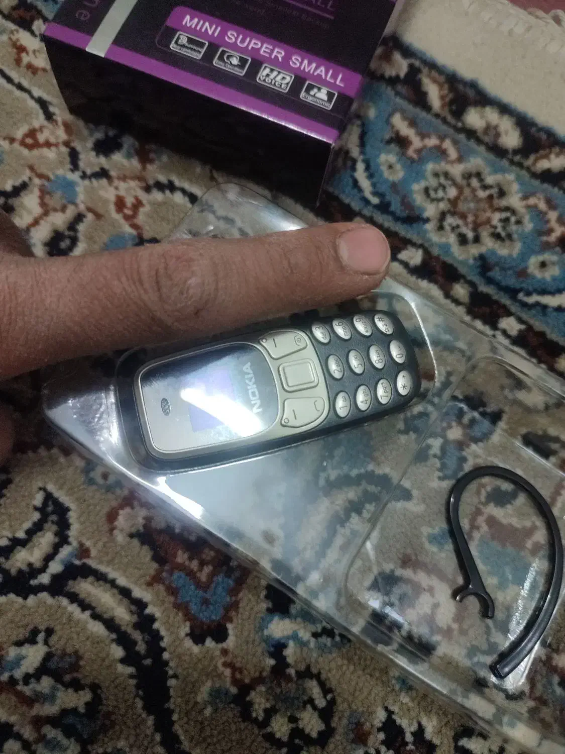 گوشی بند انگشتی|موبایل|کاغذکنان, |دیوار