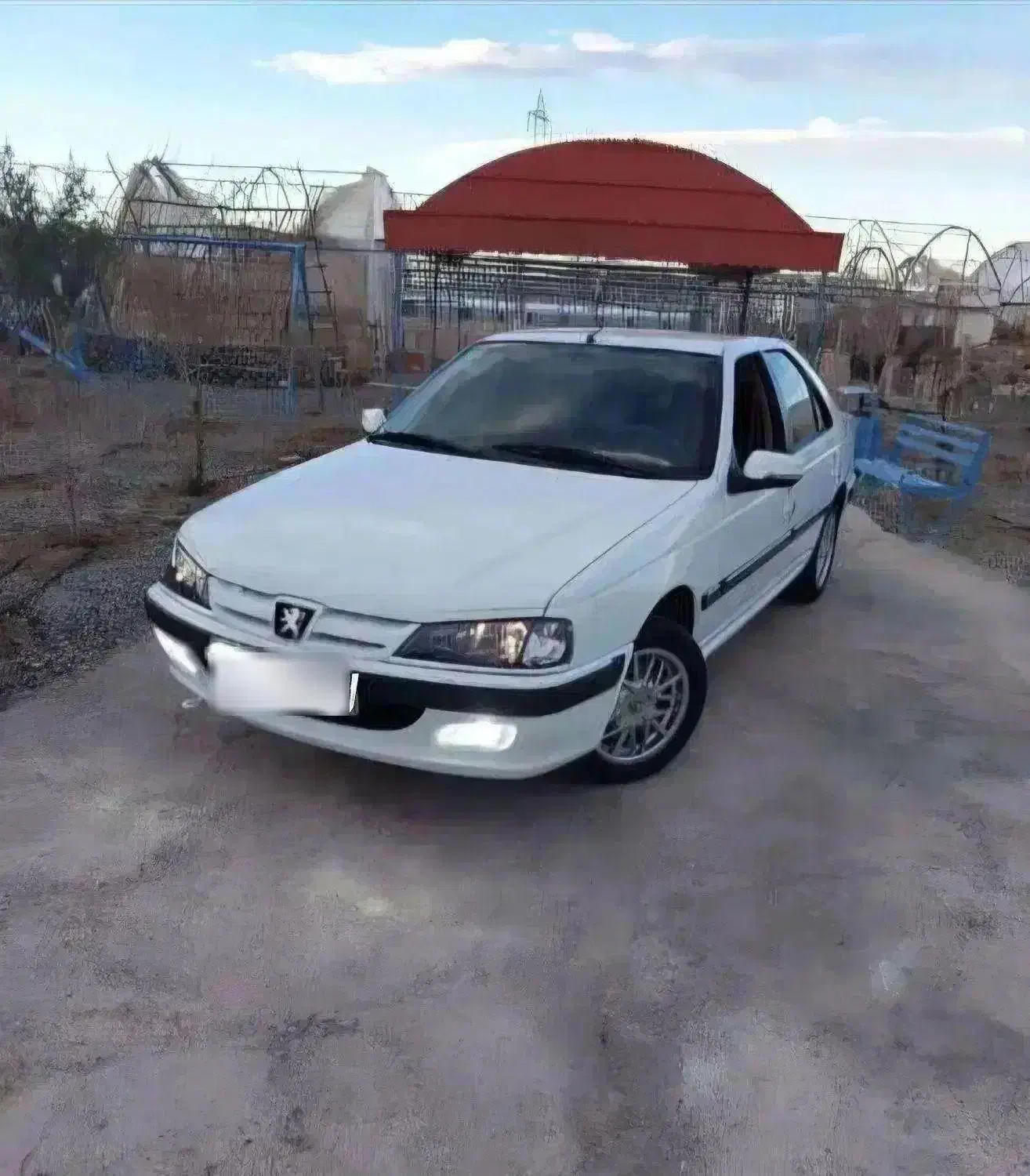 پژو پارس سال مدل ۱۴۰۰ سفید موجود در جزیره کیش|خودرو سواری و وانت|بندرعباس, |دیوار