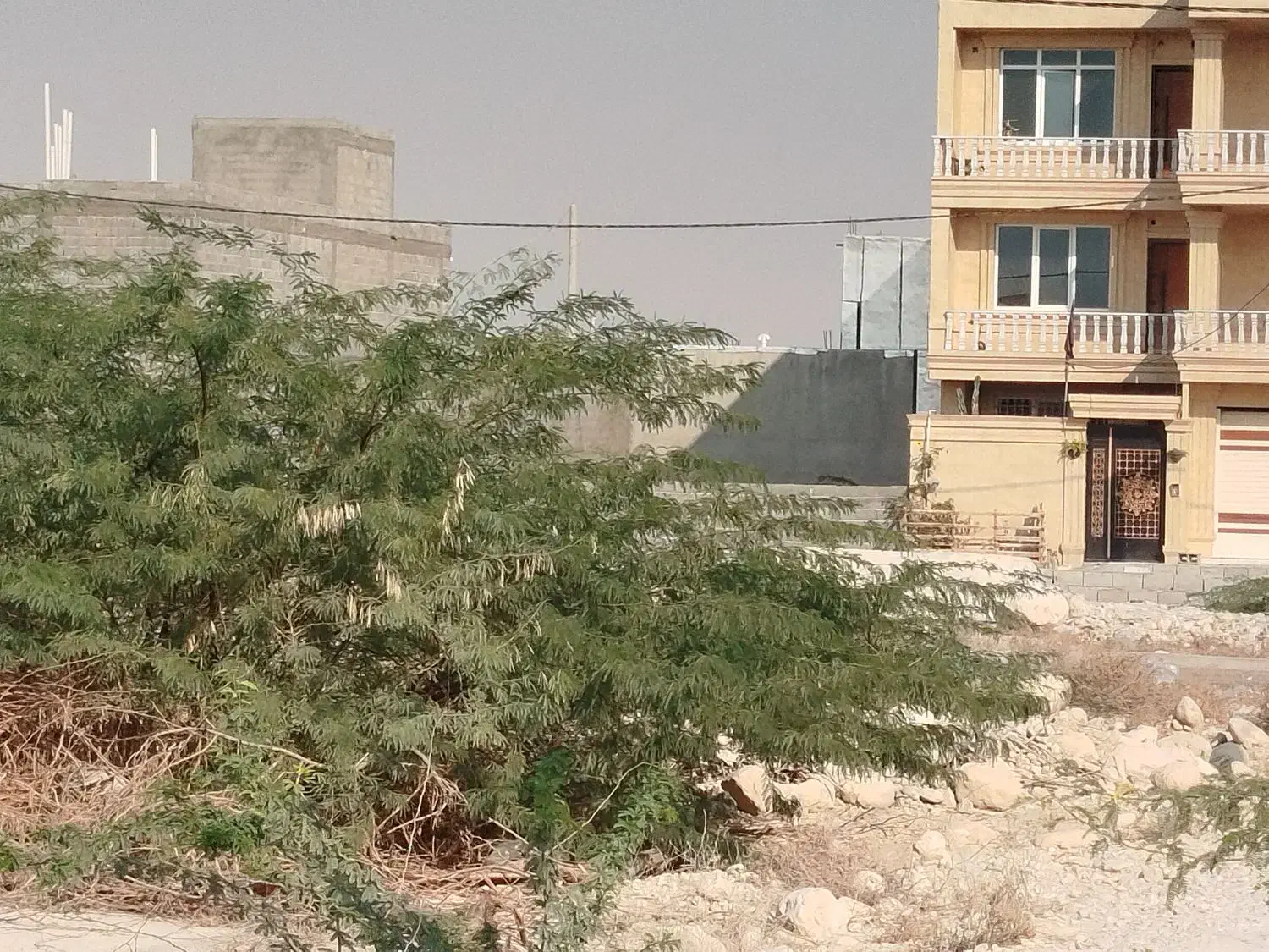 معاوضه پژو پارس تیوفایو و یک ملک ۲۰۰متری با|خودرو سواری و وانت|بندر دیر, |دیوار