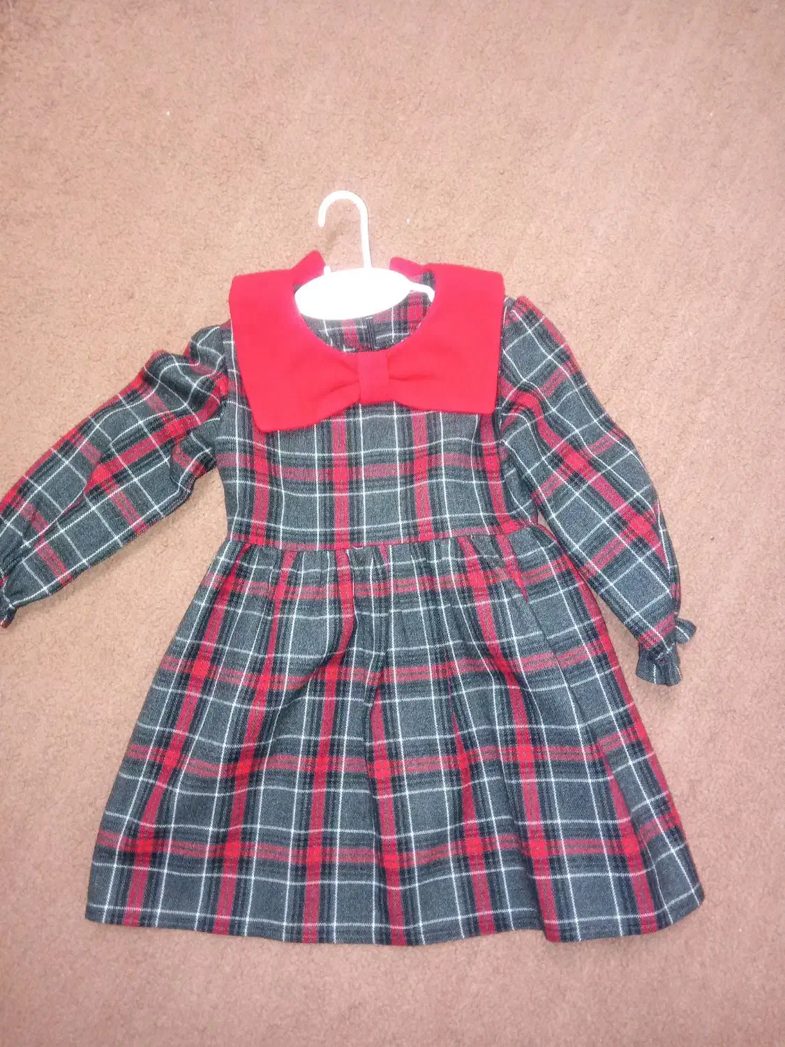 لباس دخترانه|کفش و لباس بچه|قم, قلعه کامکار|دیوار