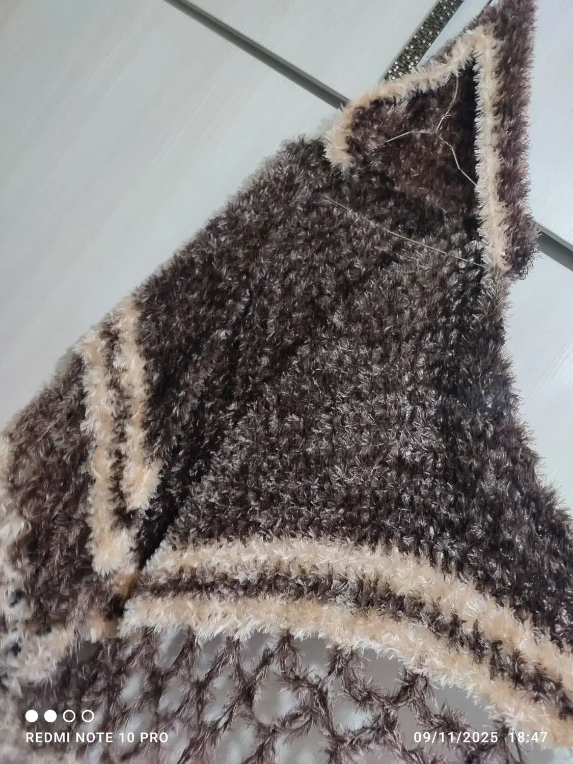 شنل|لباس|مشهد, کوشش|دیوار