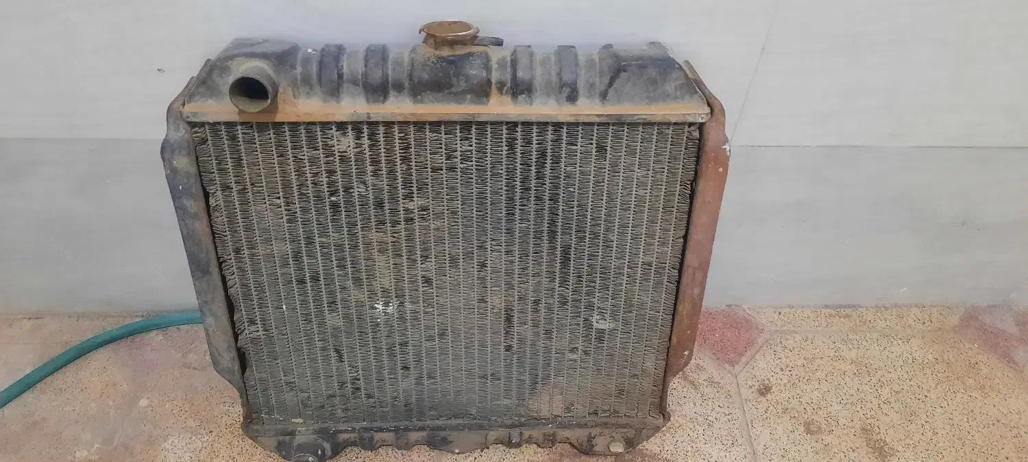 رادیاتور ‌و‌یک جفت لاستیک نیسانی|قطعات یدکی و لوازم جانبی|رفسنجان, |دیوار