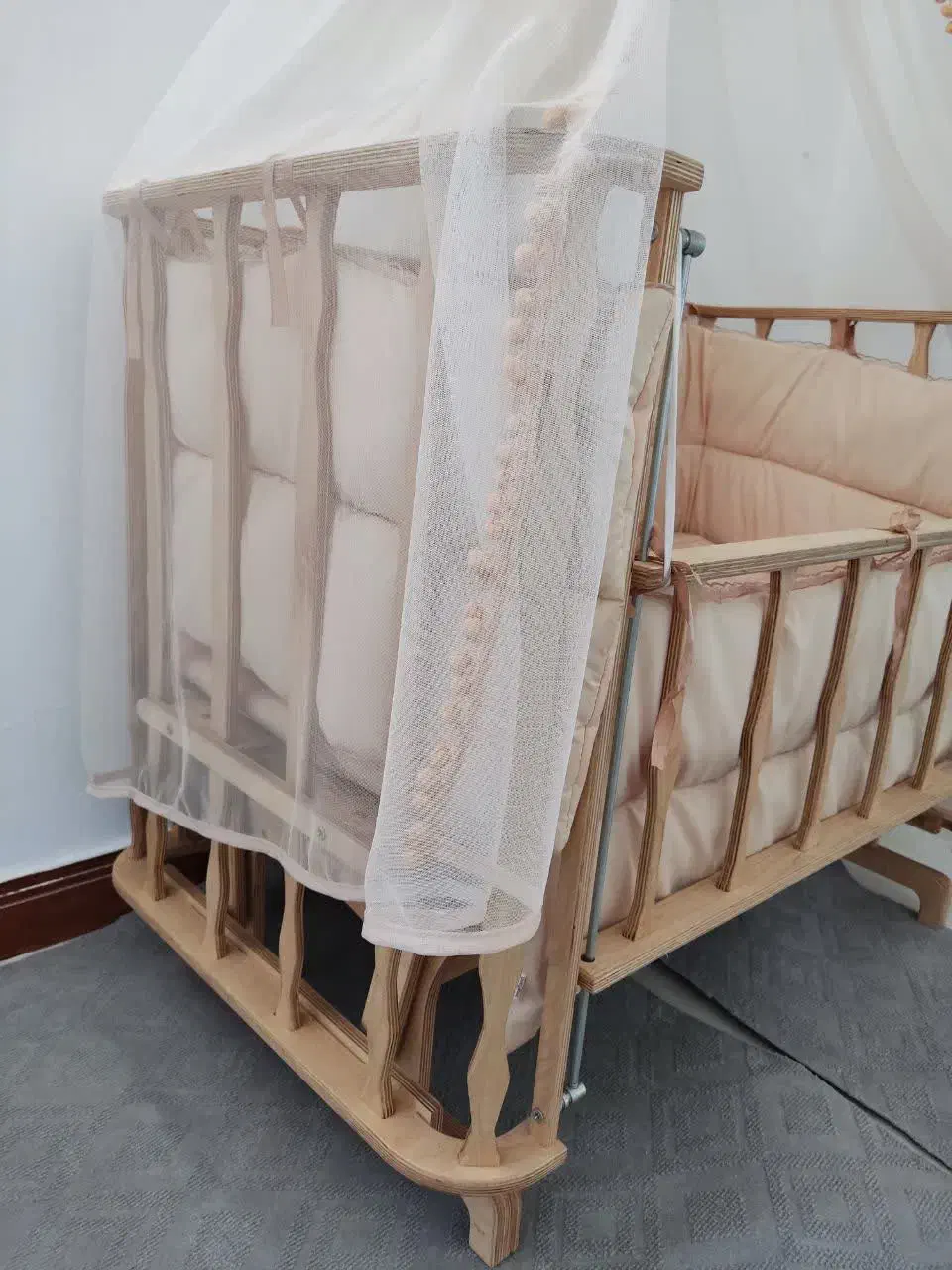 گهواره نوزاد  ،  تخت نوزاد،  کریر،  اغوشی حمل کمک|تخت و صندلی بچه|فردوسیه, |دیوار