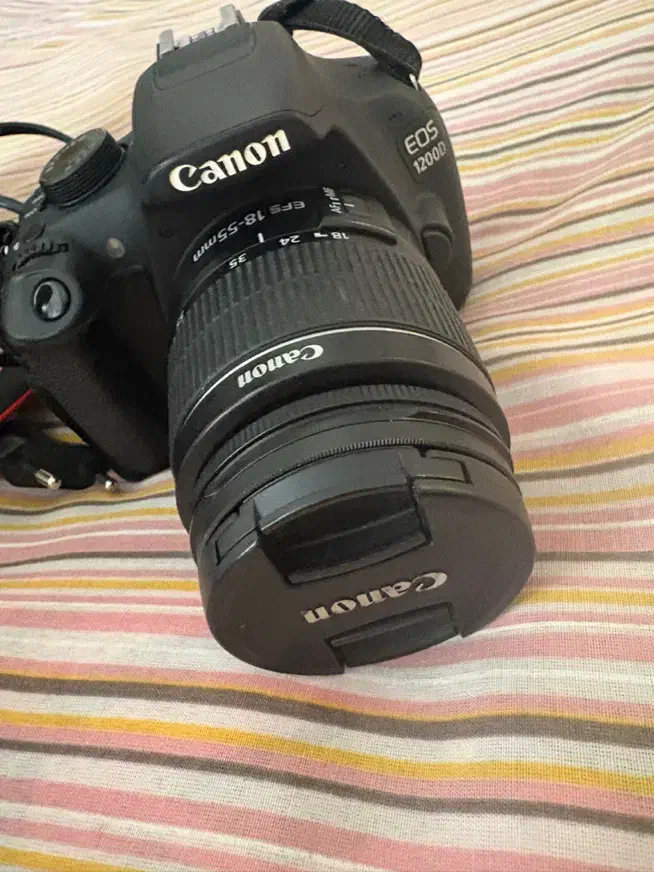 دوربین کنون ۱۲۰۰ دی در حد با لنز|دوربین عکاسی و فیلمبرداری|تهران, هروی|دیوار