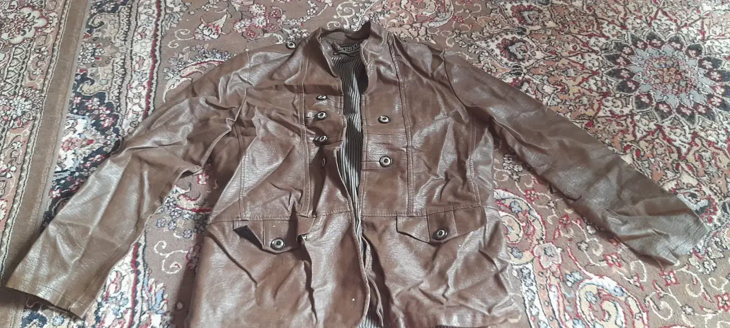 درحدنو|لباس|مشهد, شهید علی محمدی|دیوار