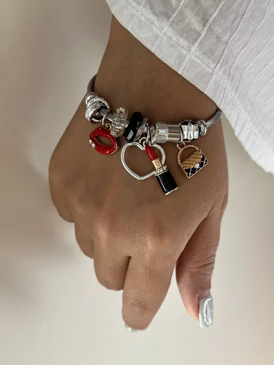 دستبند پاندورا|جواهرات|ری, دیلمان|دیوار