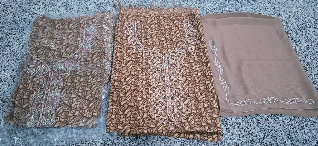 لباس  مخور  پارچه|لباس|بندر کنگان, |دیوار
