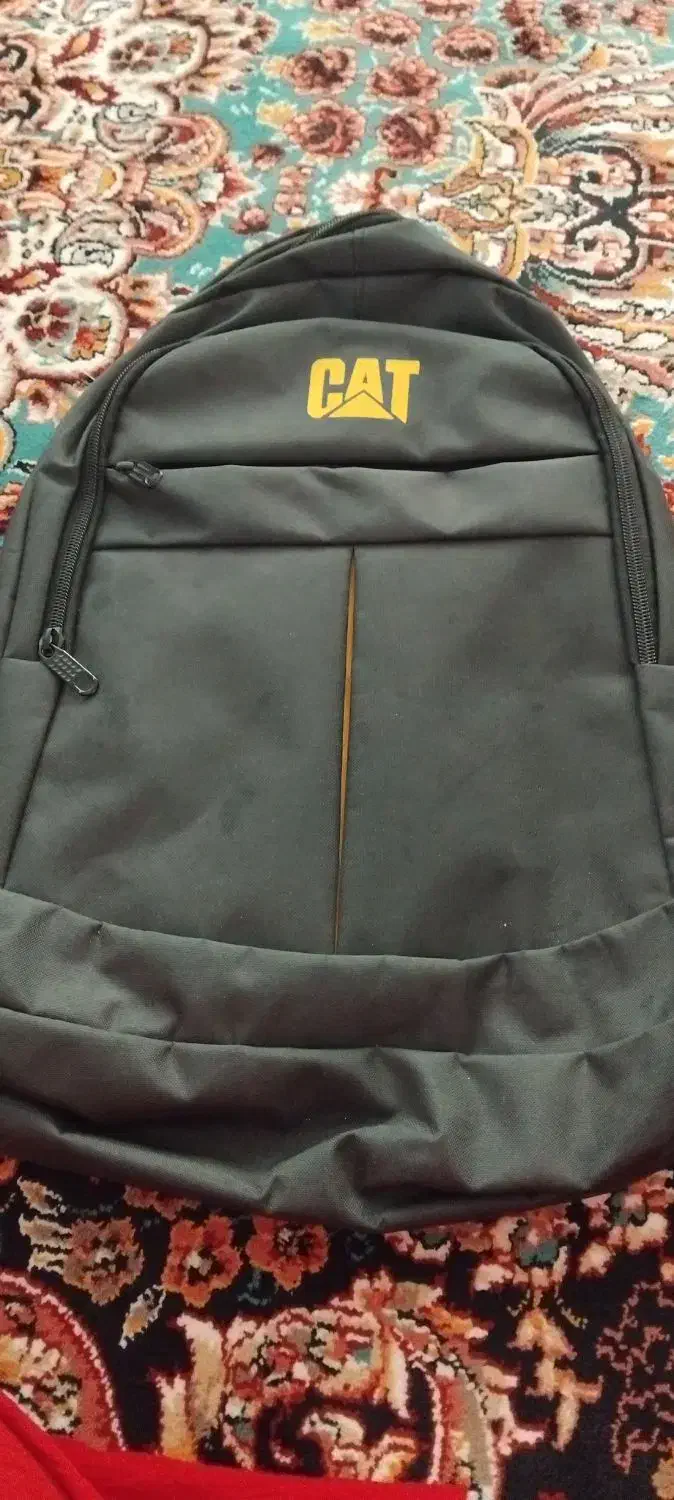 کیف مدرسه|کیف، کفش، کمربند|قم, امامزاده ابراهیم|دیوار