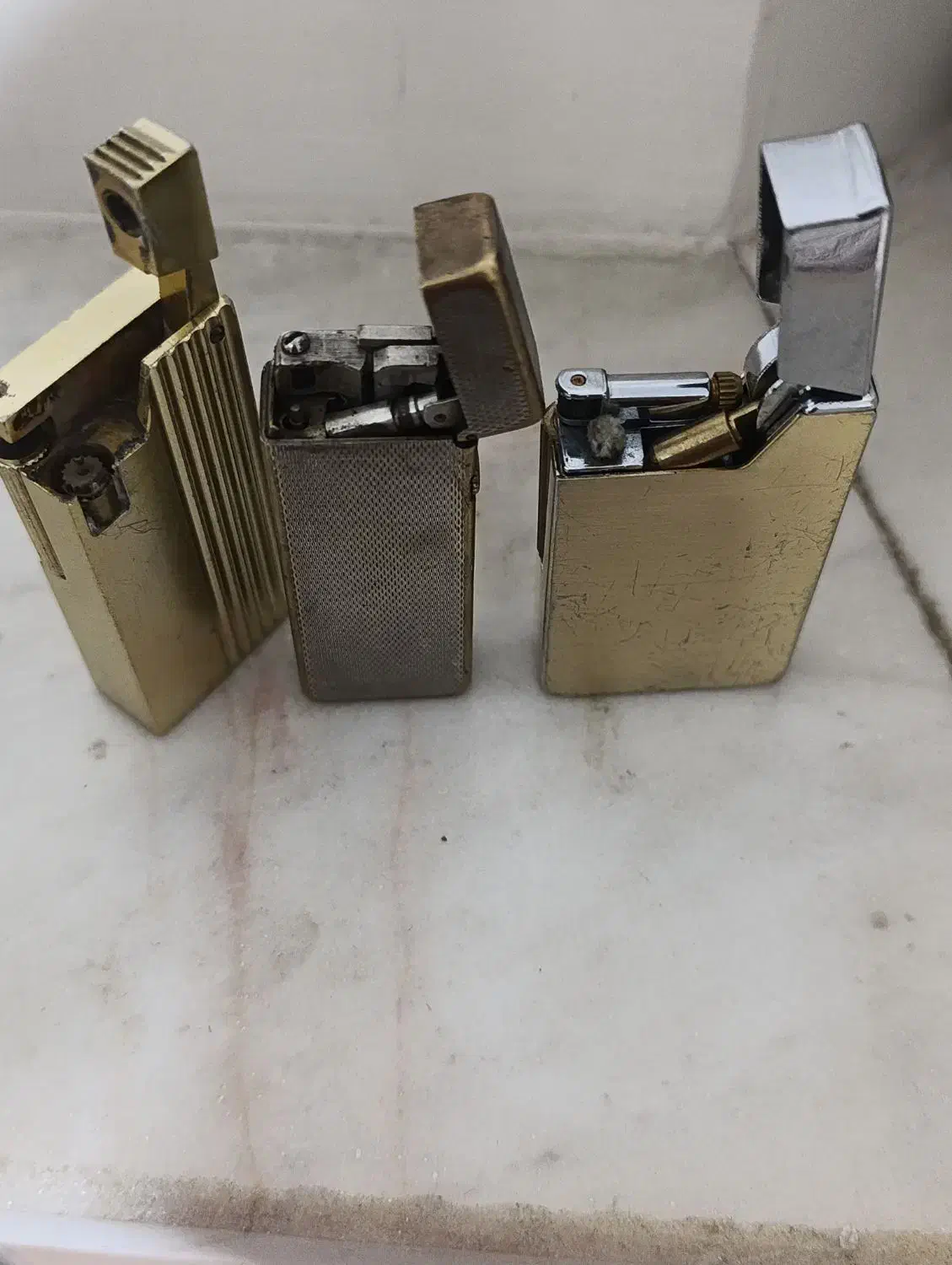 فندک دانهیل سویسی|کلکسیون اشیاء عتیقه|رودهن, |دیوار