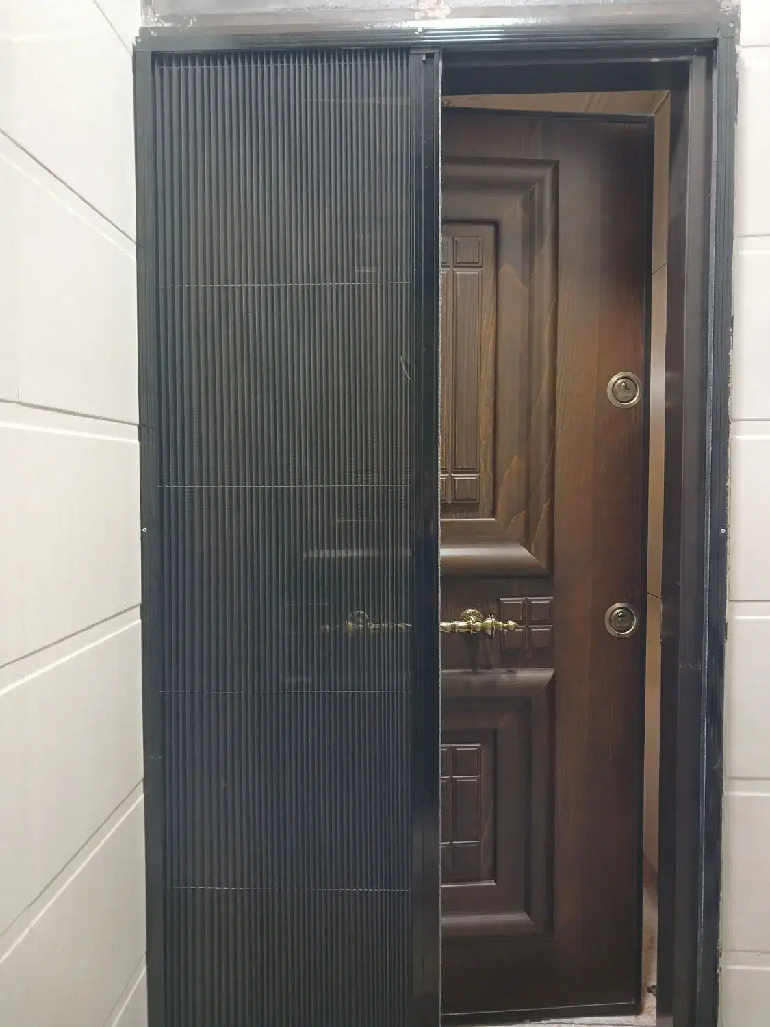 ساخت و نصب توری پلیسه کشوئی|خدمات پیشه و مهارت|دزفول, |دیوار