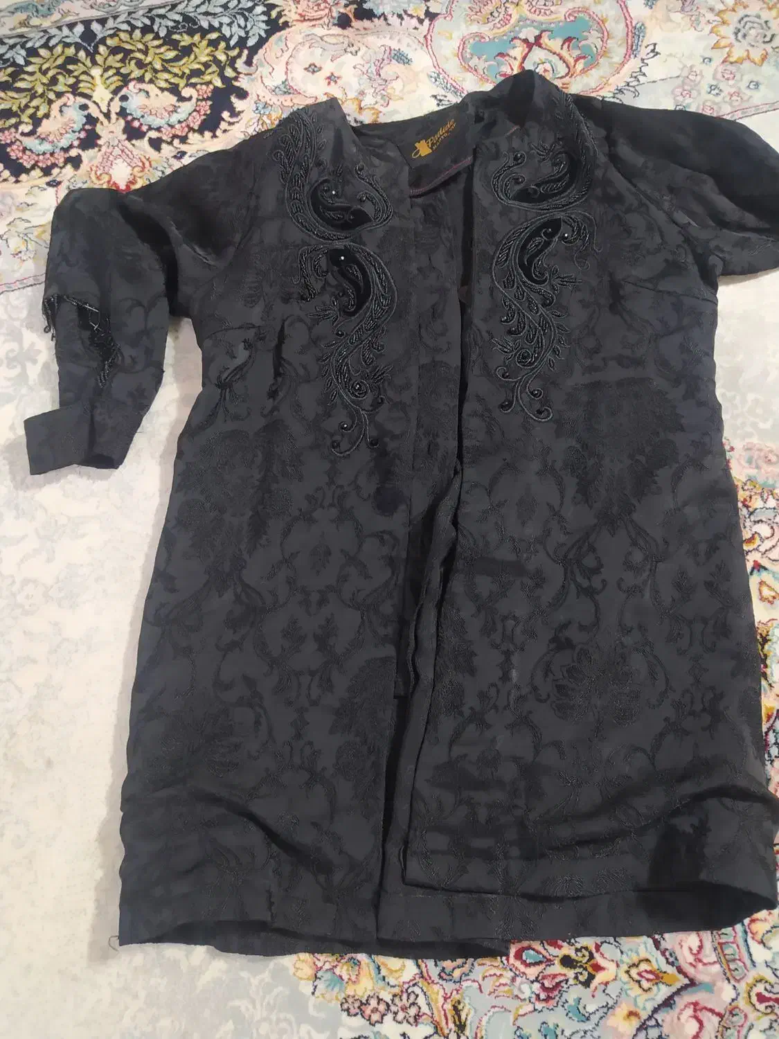 مانتومشکی|لباس|تربت جام, امام|دیوار