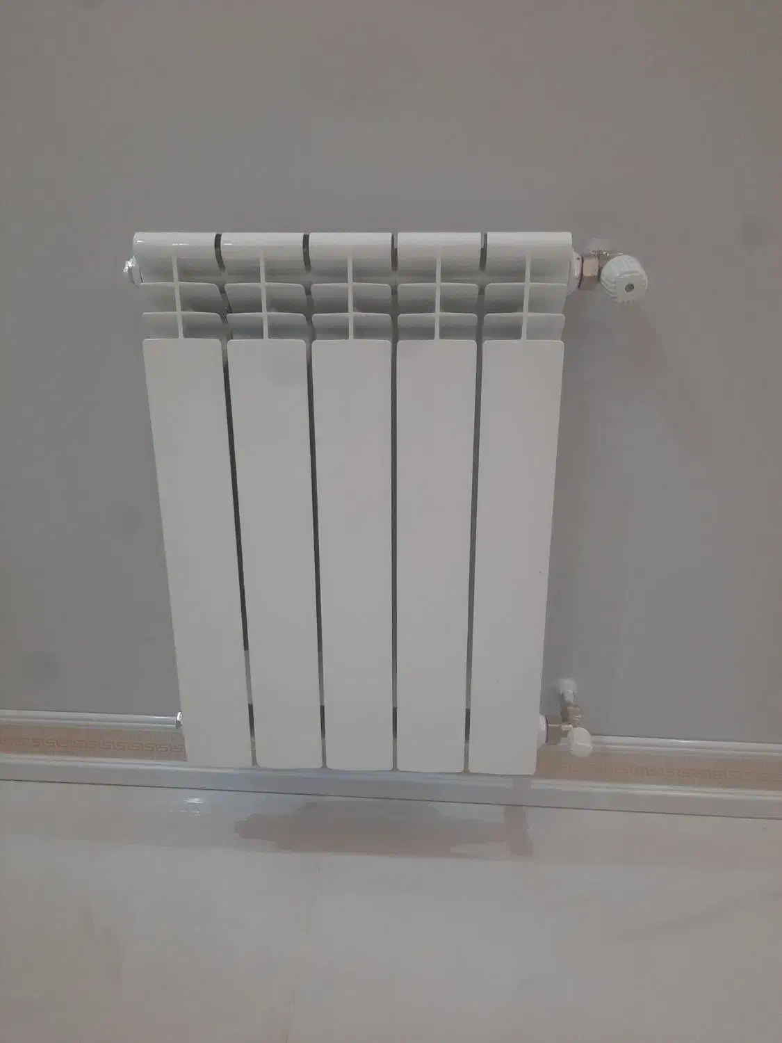 نصب انواع رادیاتور شوفاژ پنلی وپره ای|آبگرمکن، پکیج، شوفاژ|دزفول, |دیوار