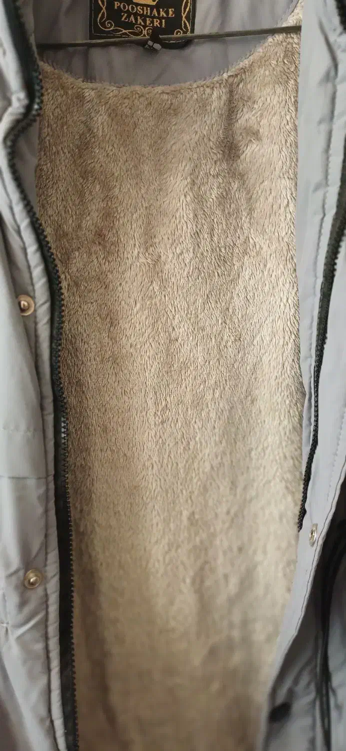 کاپشن|لباس|قم, نیروگاه|دیوار