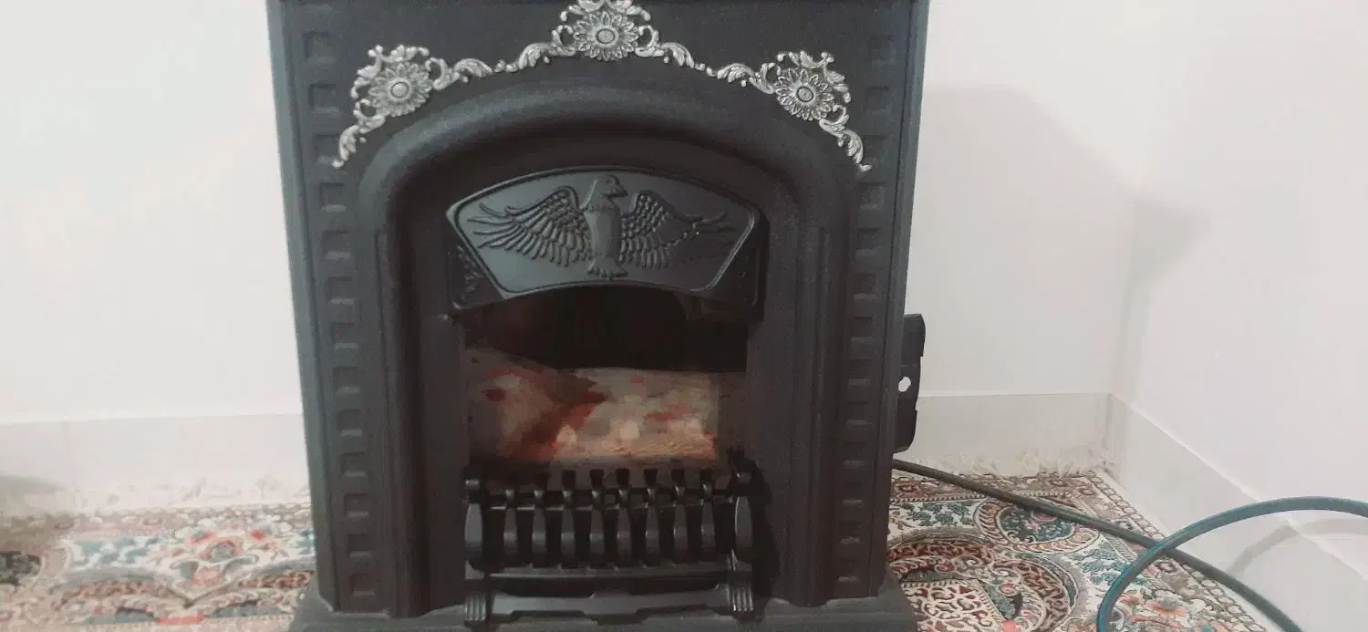 بخاری طرح شومینه بسیار تمیز|بخاری، هیتر، شومینه|بیرجند, |دیوار