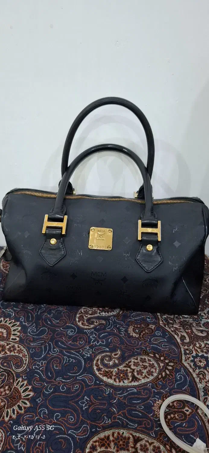 کیف|کیف، کفش، کمربند|مسجد سلیمان, |دیوار