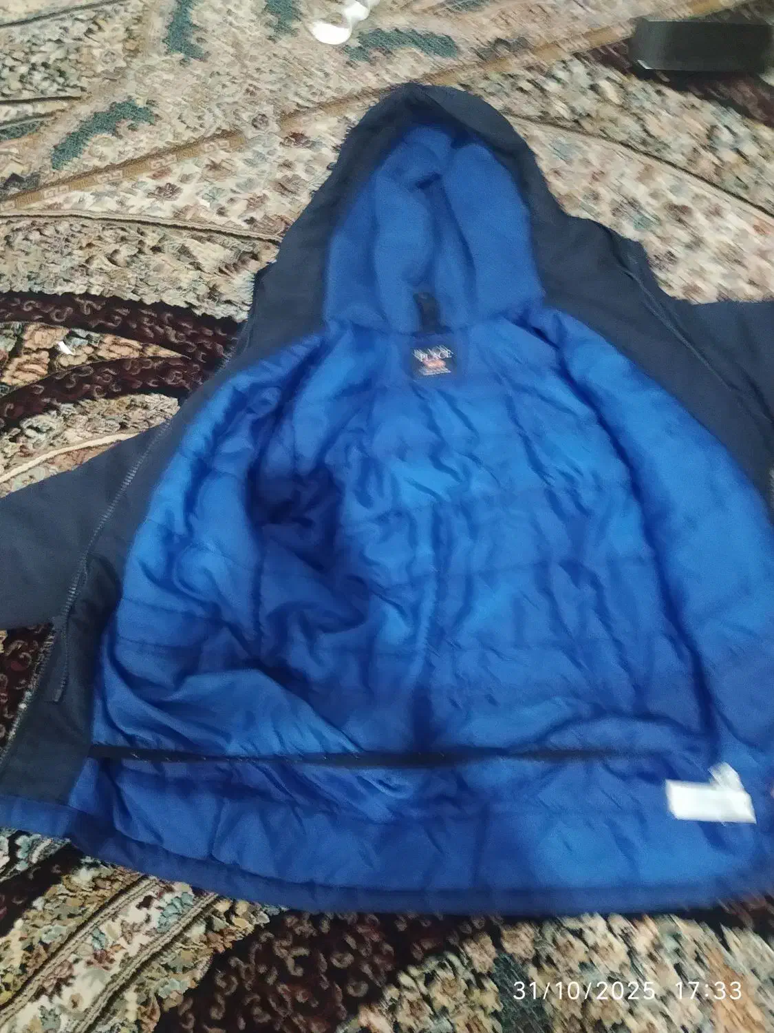 کاپشن|لباس|ایلام, |دیوار