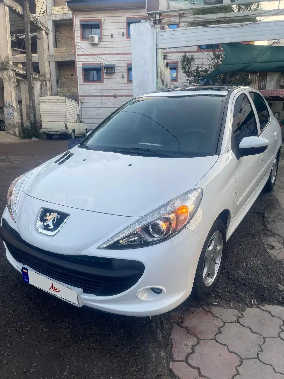 ۲۰۷ مدل ۱۴۰۱ سقف پانا|خودرو سواری و وانت|رشت, بوسار|دیوار