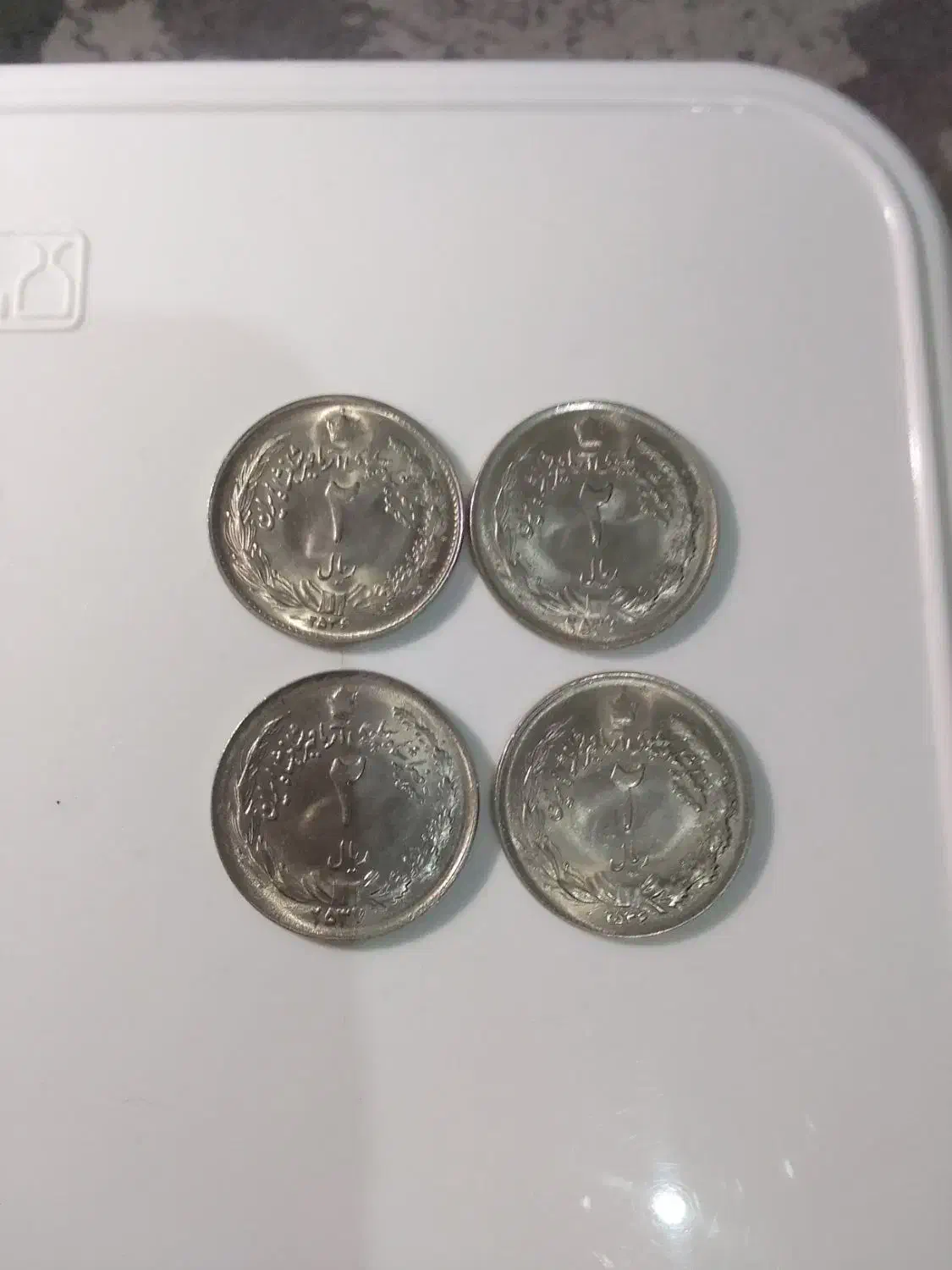 تعدادی سکه قدیمی پهلوی|کلکسیون سکه، تمبر، اسکناس|بروجرد, |دیوار