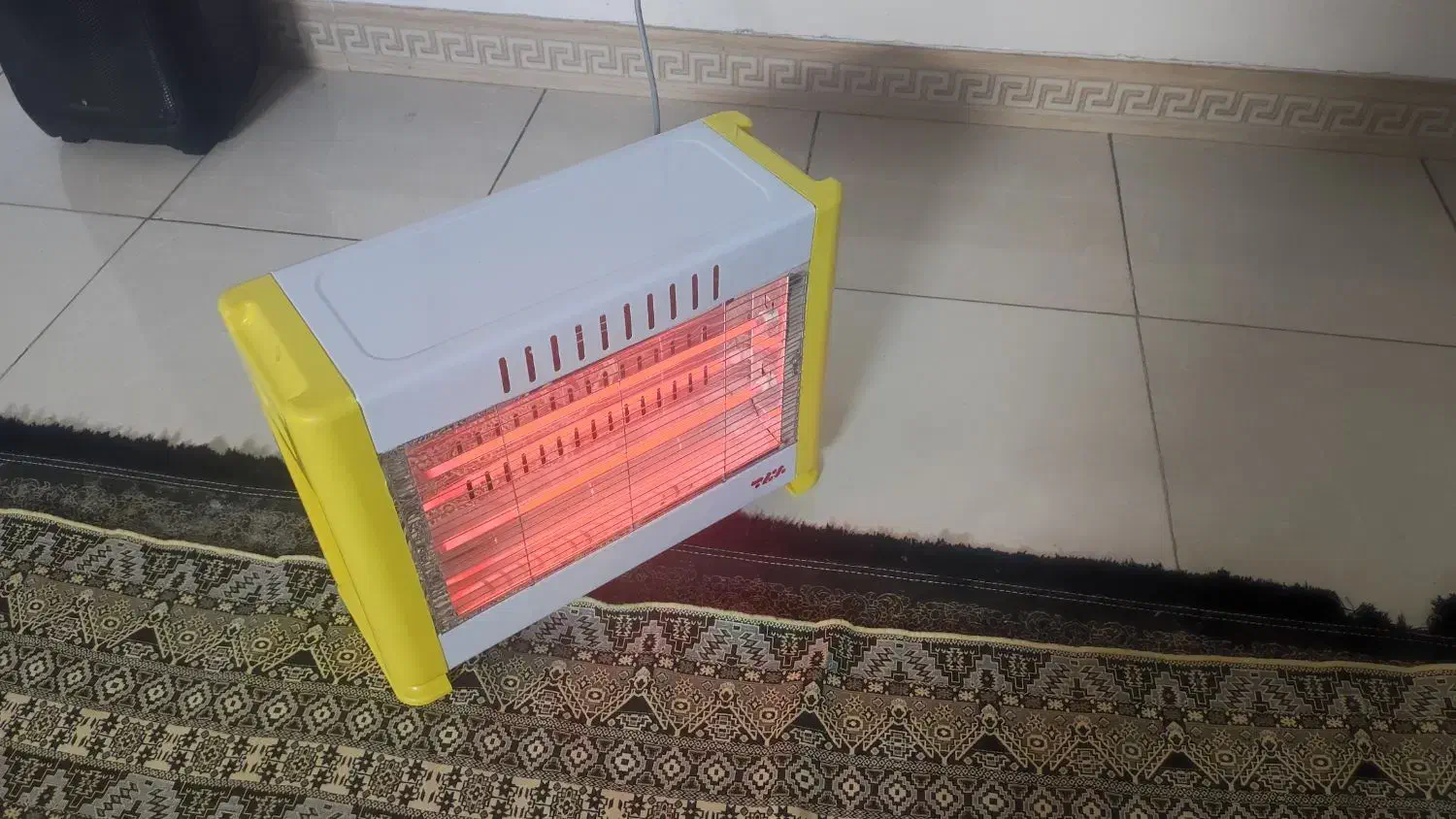 بخاری برقی در حد|بخاری، هیتر، شومینه|قم, قلعه کامکار|دیوار