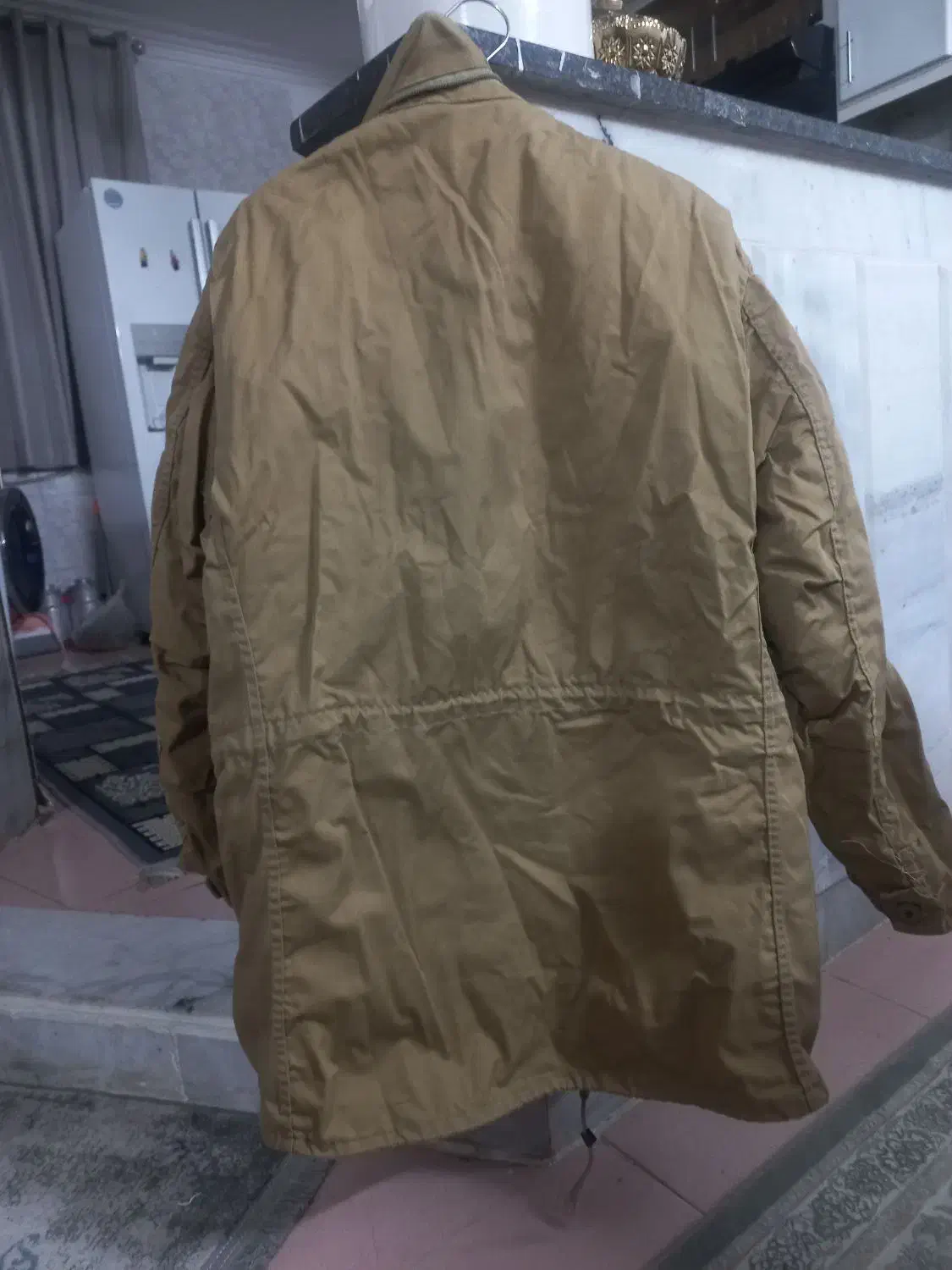 کاپشن|لباس|نیشابور, گنبد سبز|دیوار