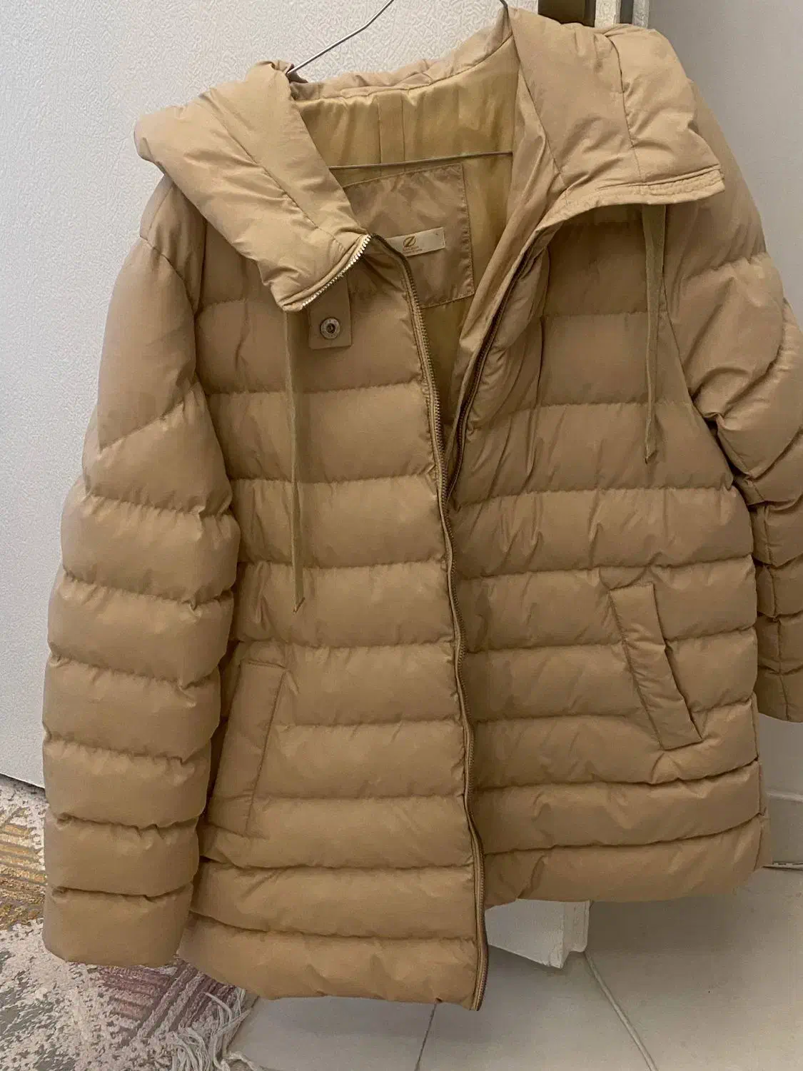 کاپشن|لباس|ایلام, |دیوار