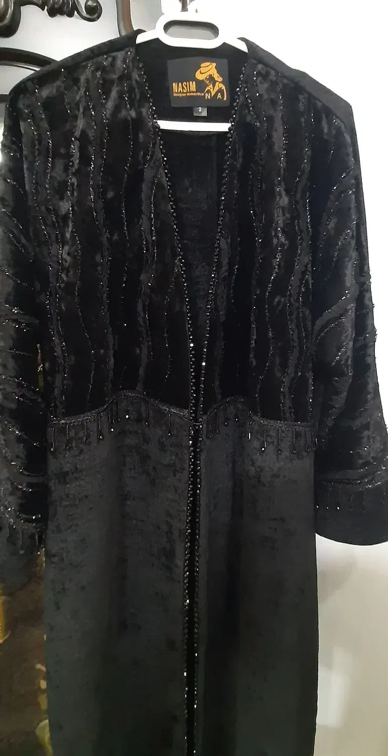 مانتو|لباس|قدس, شهر‌قدس|دیوار