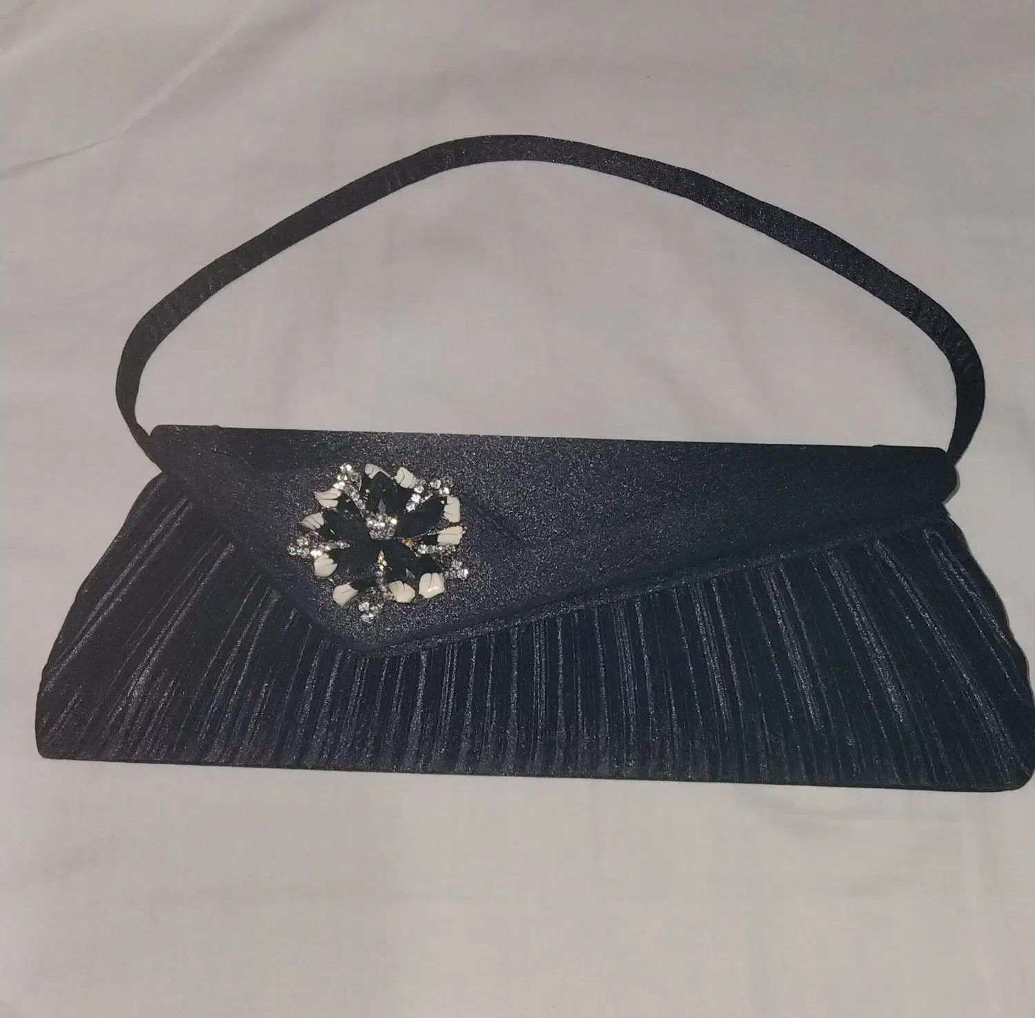 کیف مجلسی|کیف، کفش، کمربند|رشت, چله خانه|دیوار