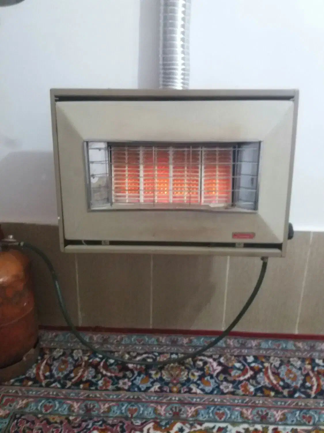 بخاری اجری دیواری|بخاری، هیتر، شومینه|تیران, |دیوار