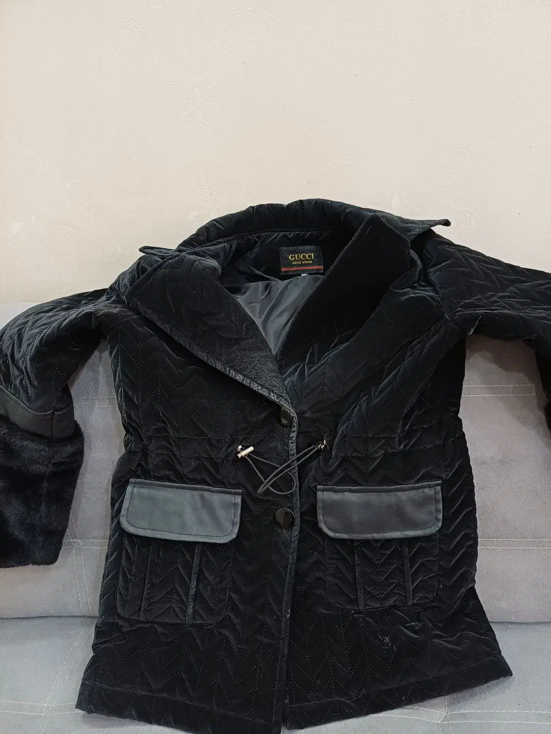 پالتو برند کوچی و‌کاپشن|لباس|قدس, شهر‌قدس|دیوار