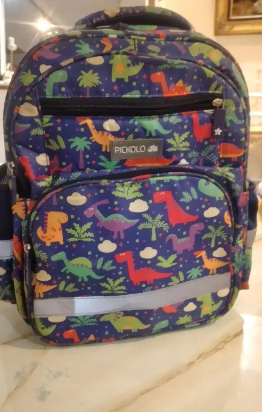 کوله پشتی به همراه لوازم تحریر|لوازم التحریر|رشت, چله خانه|دیوار