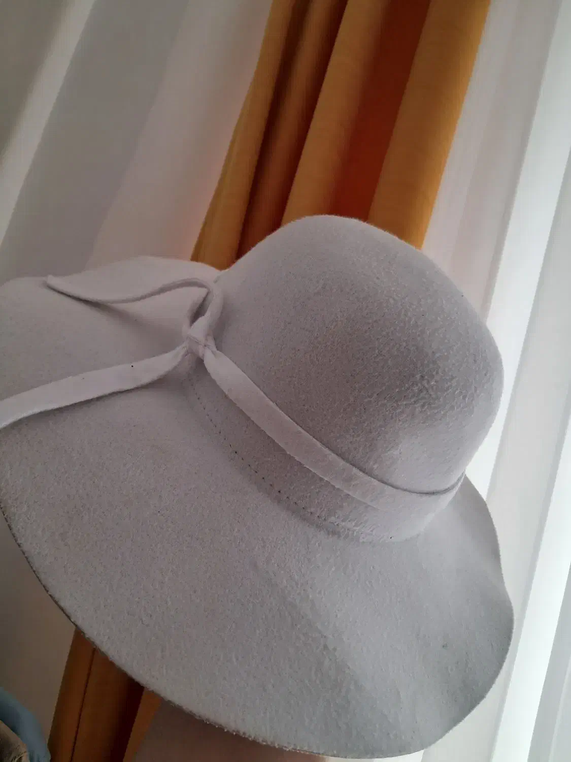 کلاه عکاسی|لباس|شیروان (خراسان), |دیوار