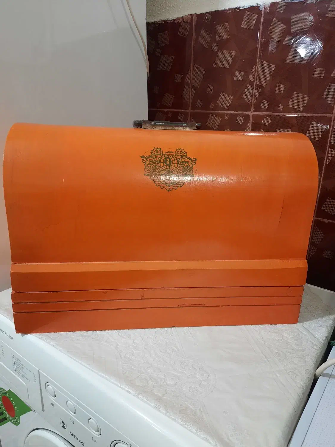 جلد چوبی چرخ خیاطی|چرخ خیاطی و ریسندگی|مسجد سلیمان, |دیوار