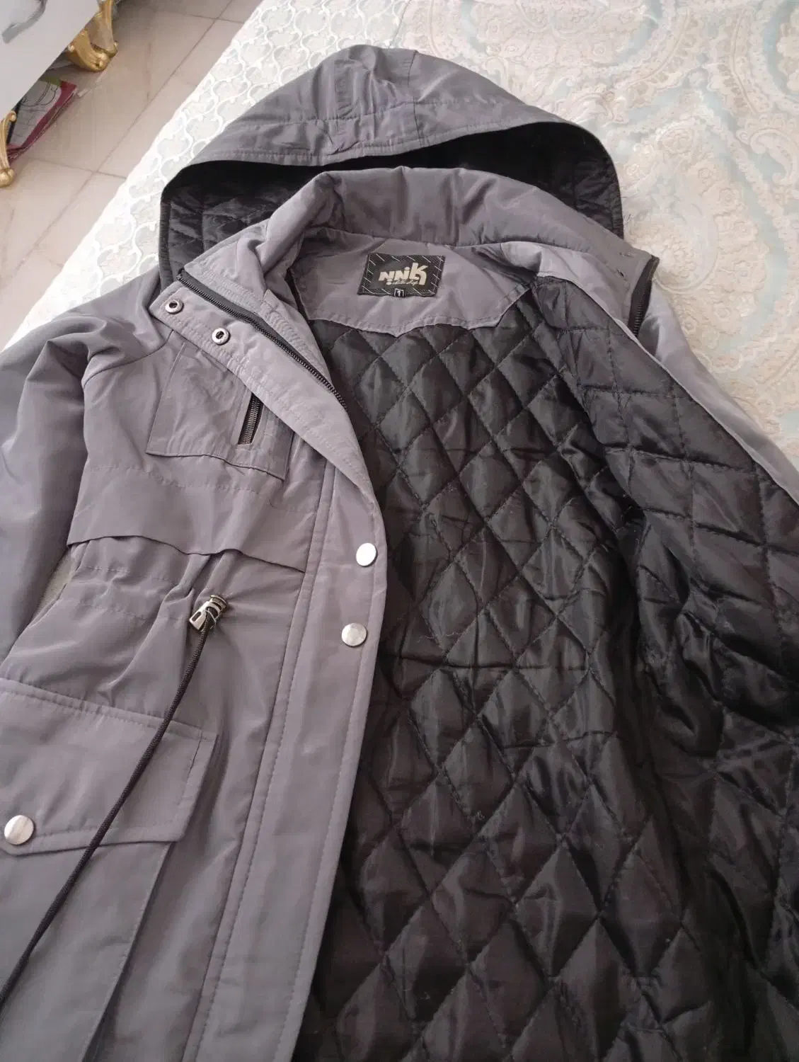 کاپشن|لباس|رشت, کوی مهر|دیوار