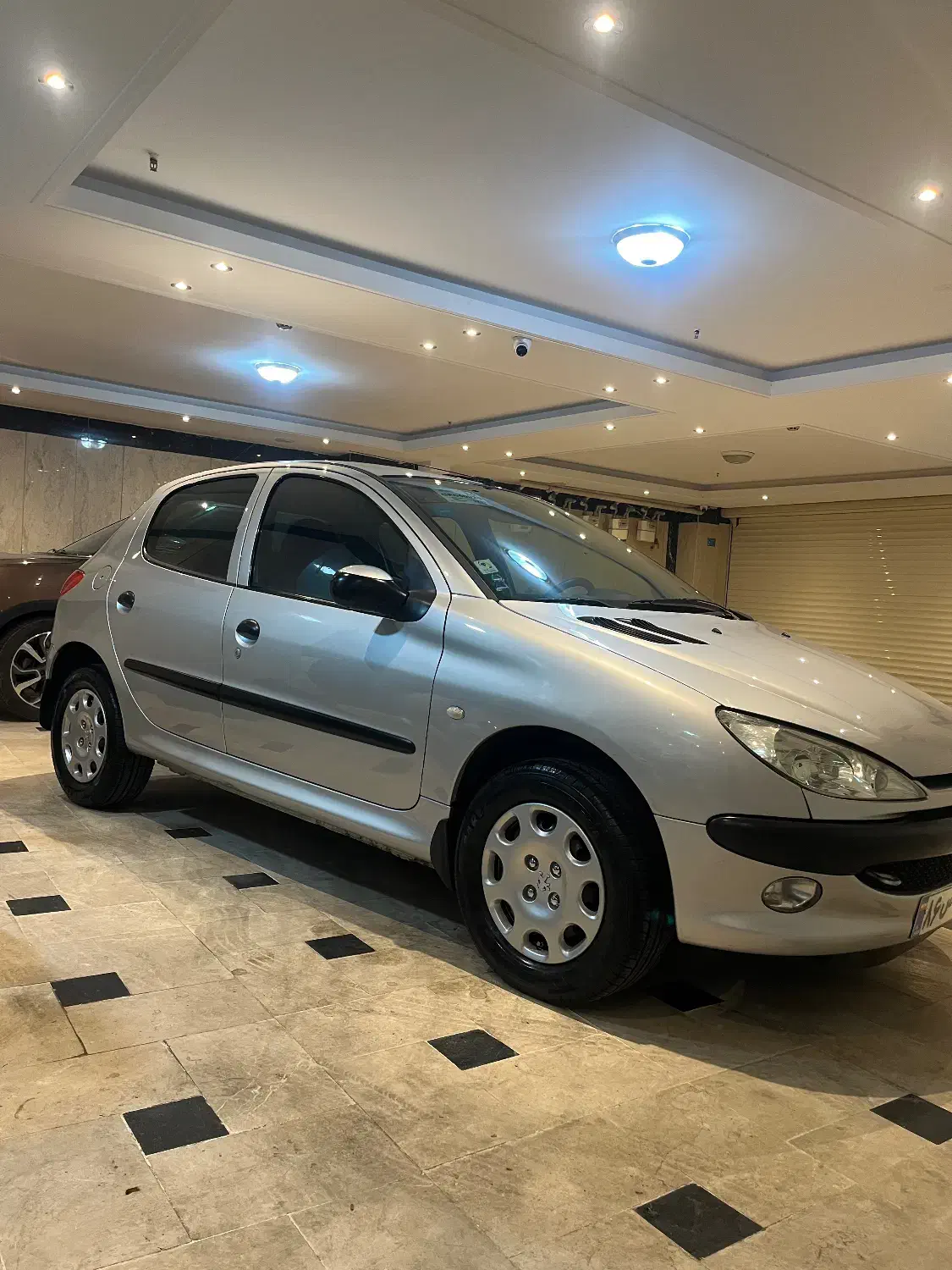 پژو۲۰۶ تیپ ۶ نقره ای ۱۷۲۰۰۰ تا کار کلکسیونی|خودرو سواری و وانت|تهران, امیریه|دیوار